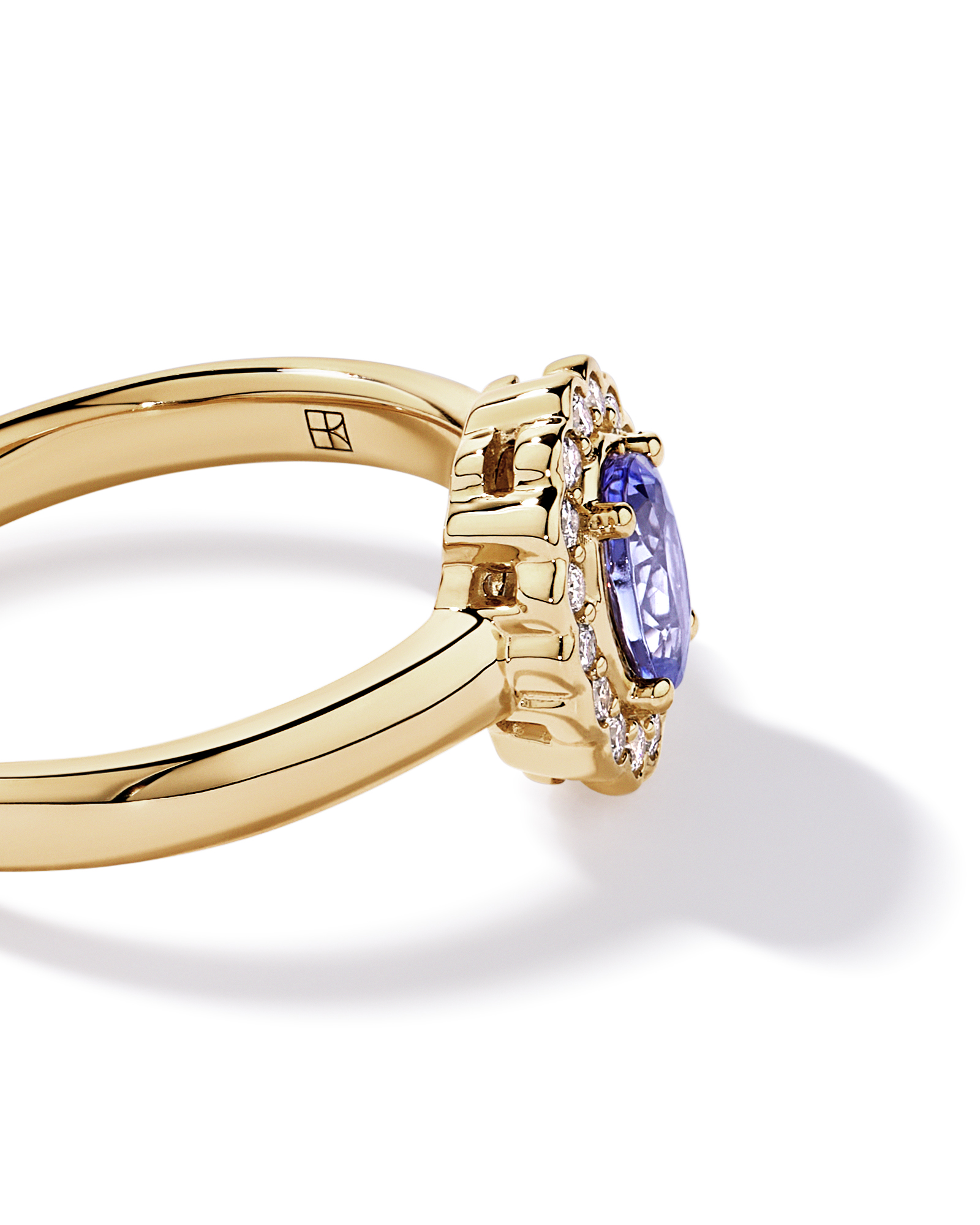 Tanzanite & 0.15TW of Diamond Halo Ring 10kt Yellow Gold
