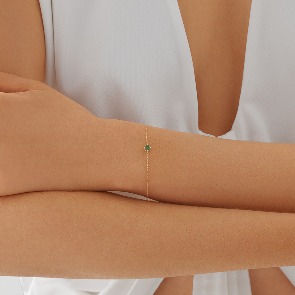 Bracelet en or jaune 10 K avec émeraude