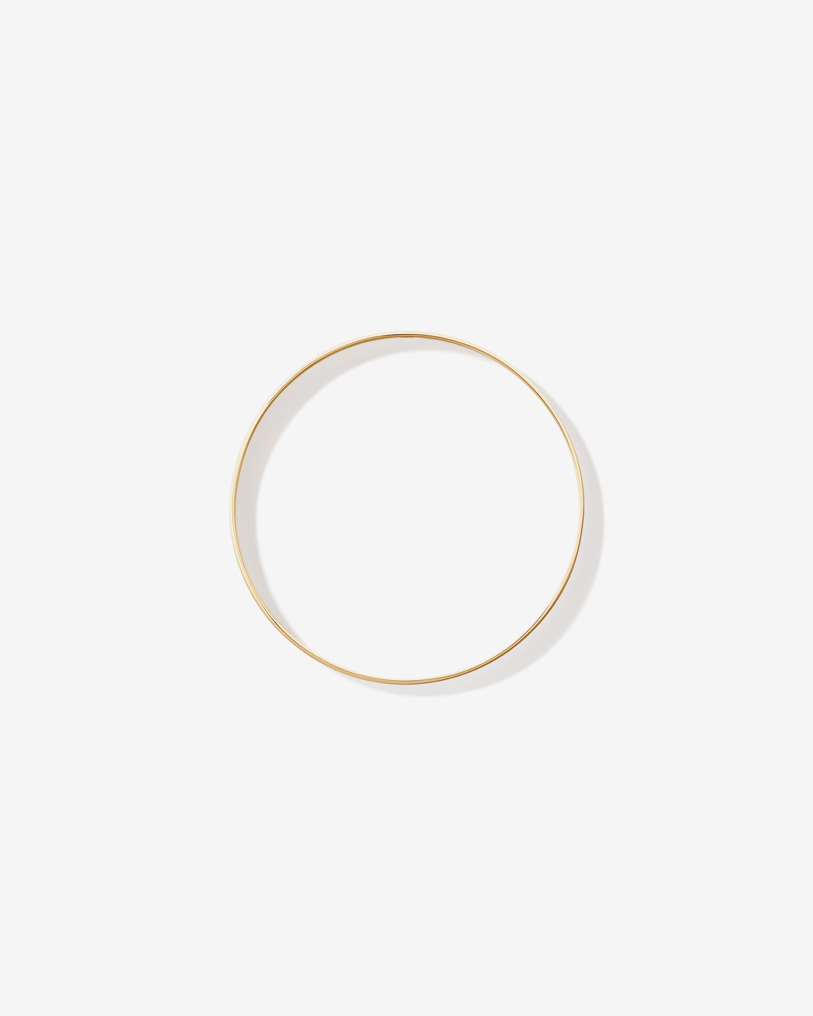 Bracelet rond solide de 65 mm (2,5") de largeur 7.3 mm en or jaune 10 carats