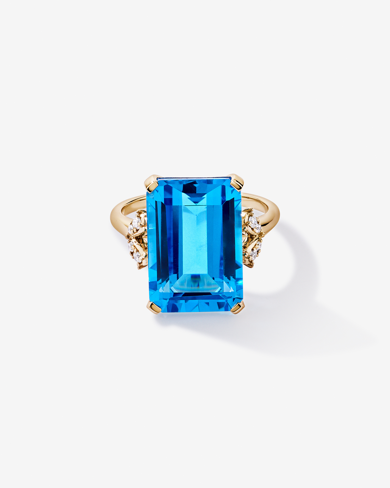 Bague en diamant Topaze bleue suisse taille émeraude et TW 0,08 carat or jaune 10 carats