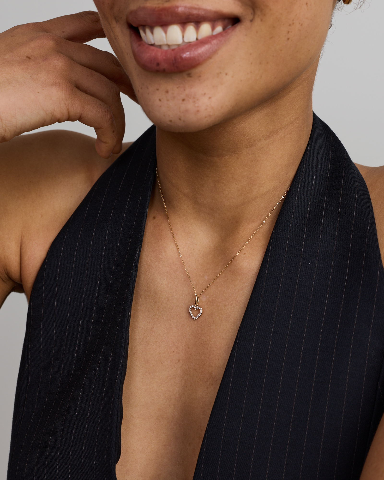 0.10TW Diamond Heart Pendant in 10kt Gold