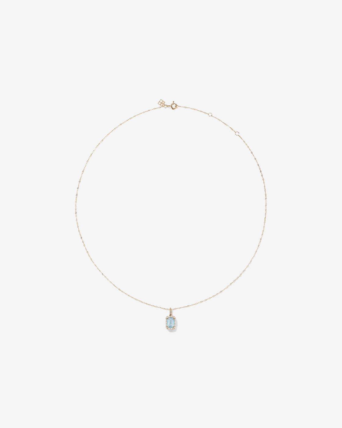 Emerald Cut Aquamarine and Diamond Halo Pendant with Chain in 10kt Yellow Gold