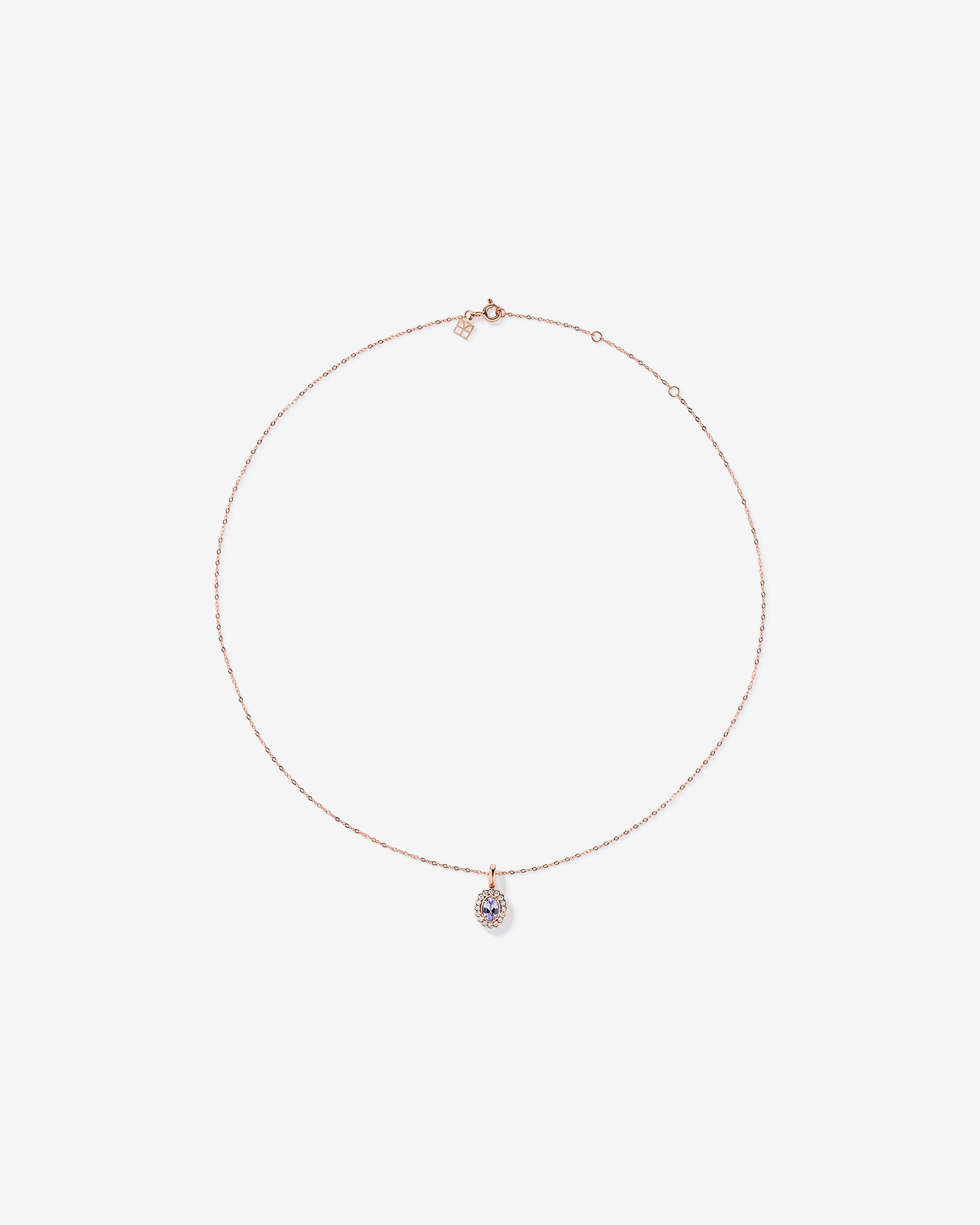 Tanzanite & 0.15TW of Diamond Halo Pendant with Chain in 10kt Rose Gold