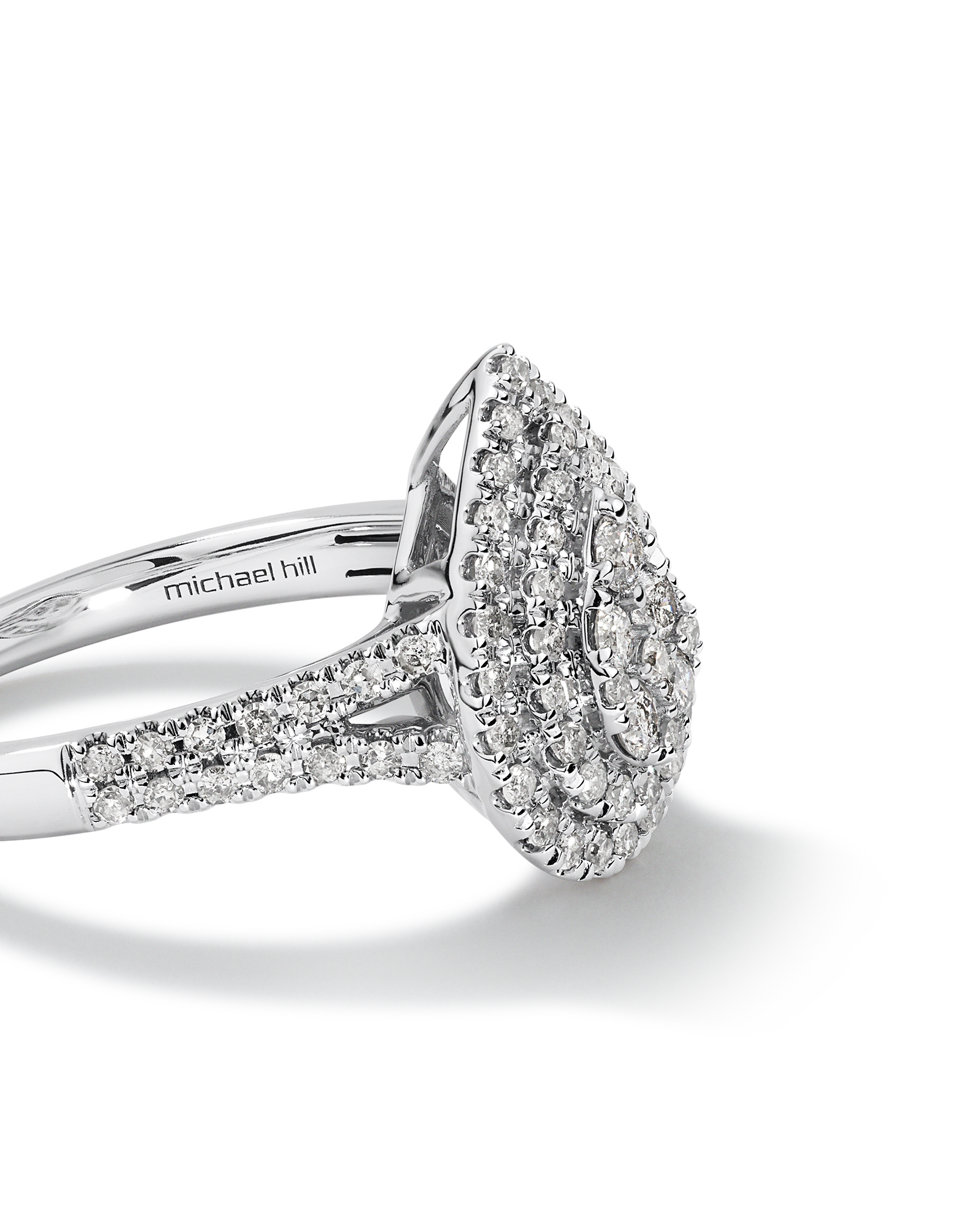 0.65 Carat TW Pear Shaped Cluster Halo Diamond Ring in 10kt White Gold