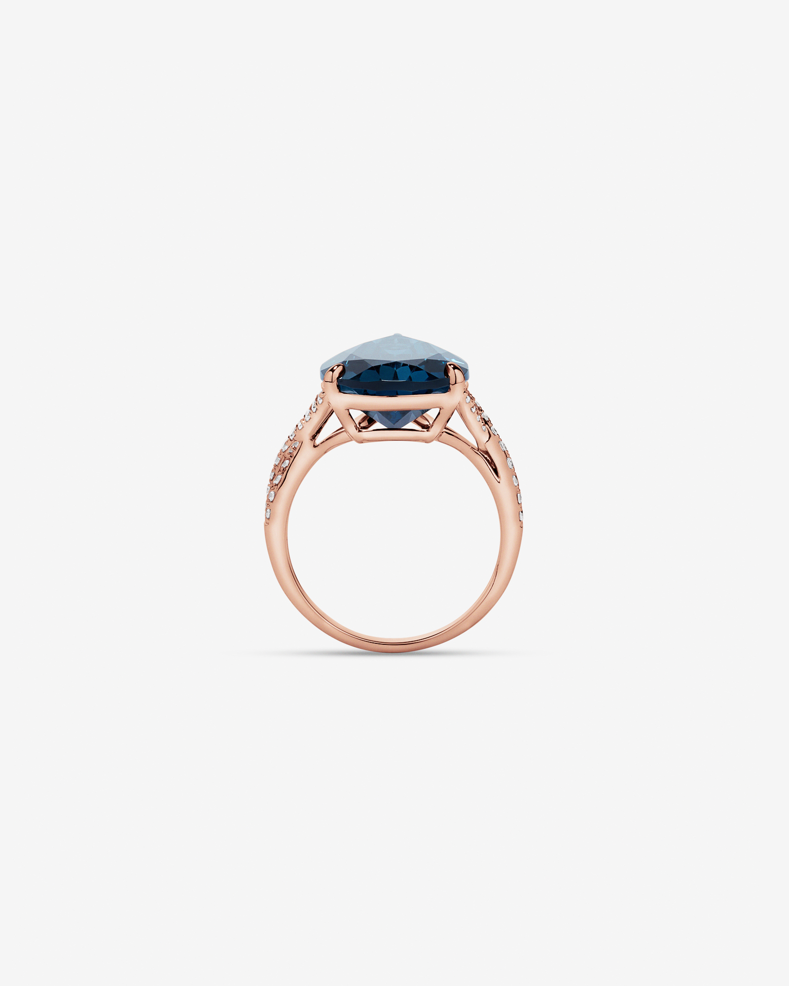 Pear Cut London Blue Topaz & 0.28 Carat TW Diamond Twist Ring 10kt Rose Gold