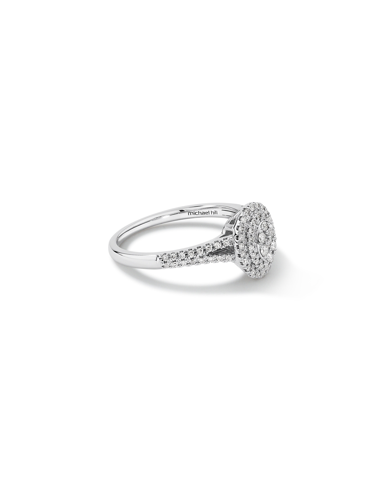 0.30 Carat TW Oval Shaped Cluster Halo Diamond Ring in 10kt White Gold