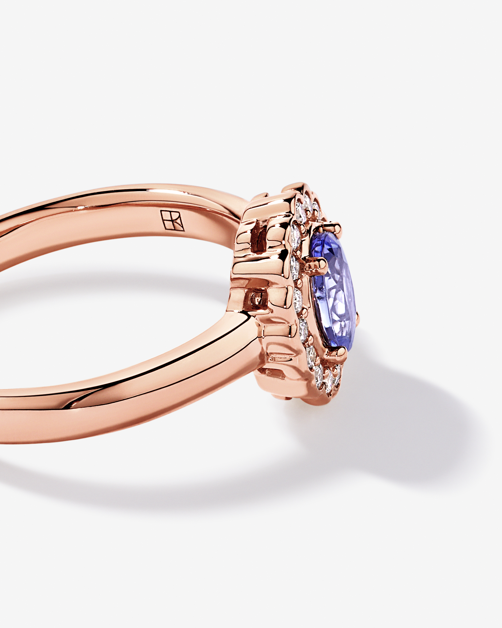 Tanzanite & 0.15TW of Diamond Halo Ring 10kt Rose Gold