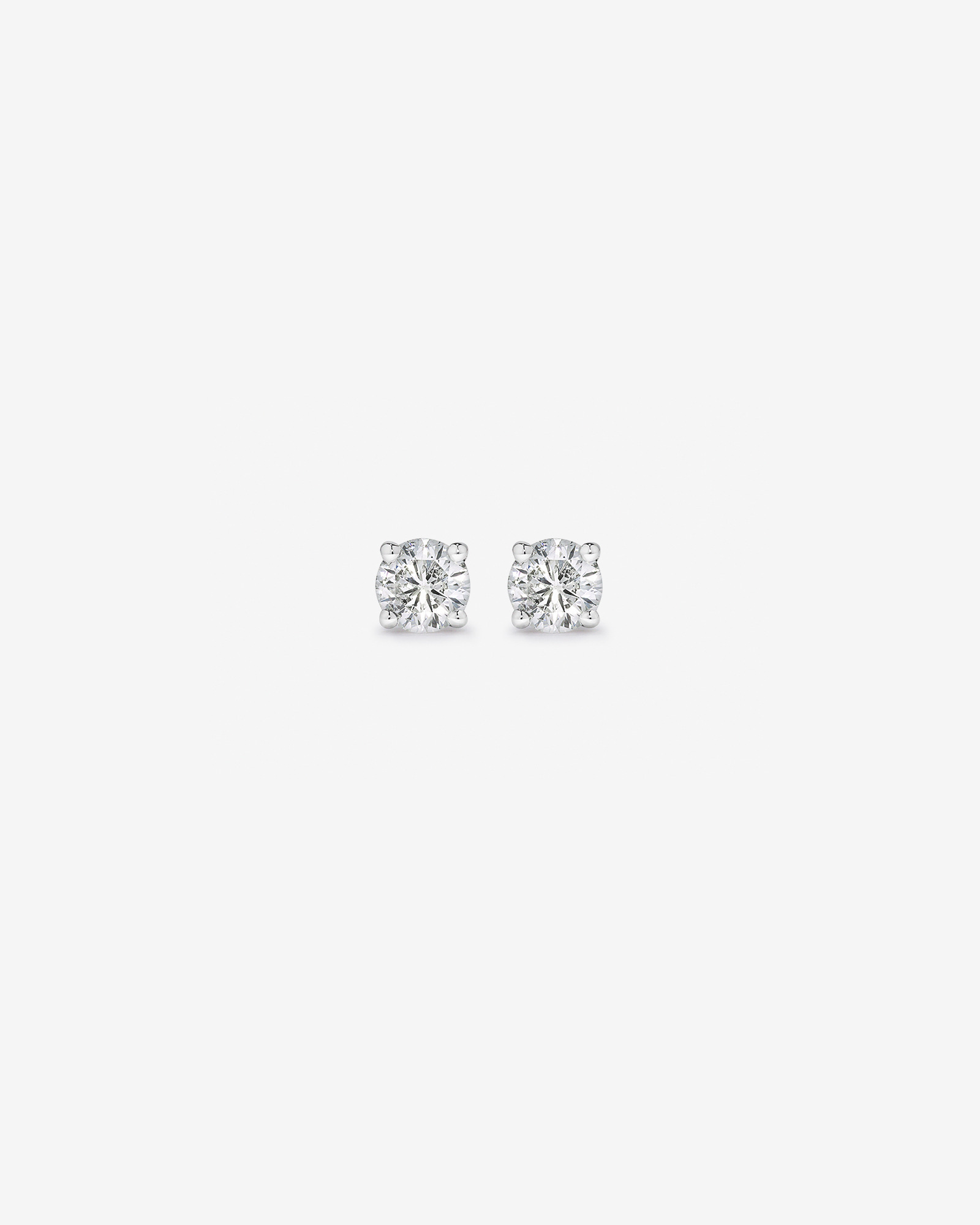 0.25 Carat TW Diamond Solitaire Stud Earrings 18kt Gold