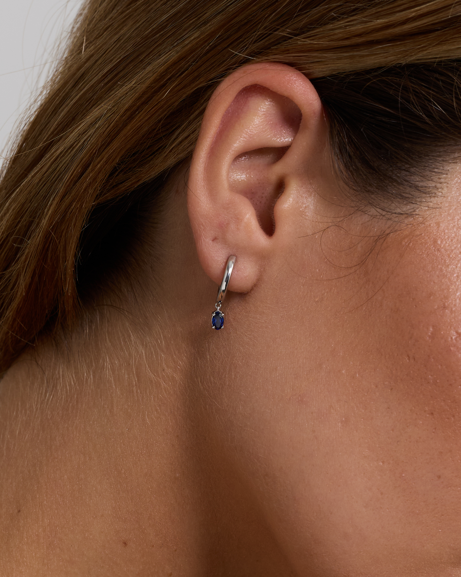 Created Sapphire Drop Huggie Hoop Earrings in Sterling Silver