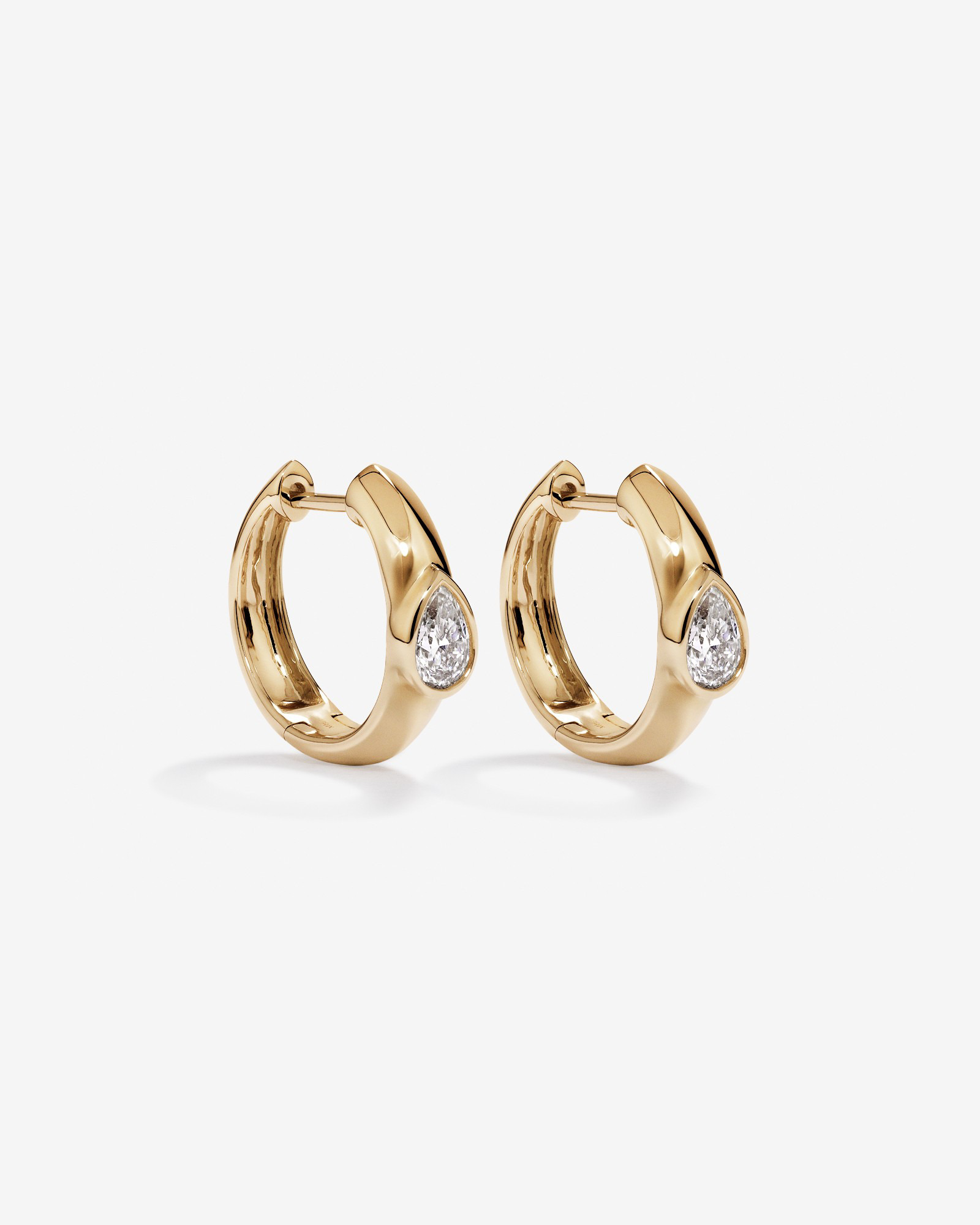 0.50 Carat TW of Laboratory-Grown Pear Cut Diamond Huggie Earrings in 10kt Yellow Gold