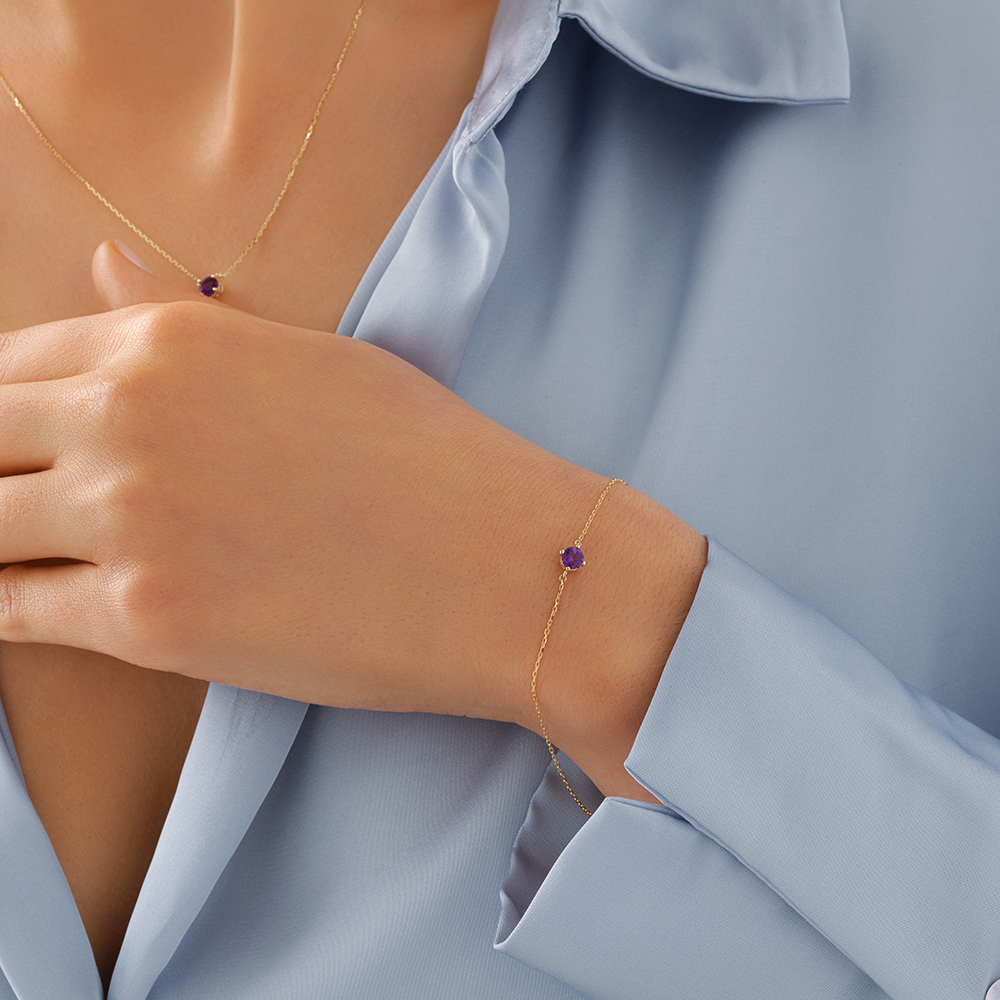 Bracelet en or jaune 10 K avec améthyste