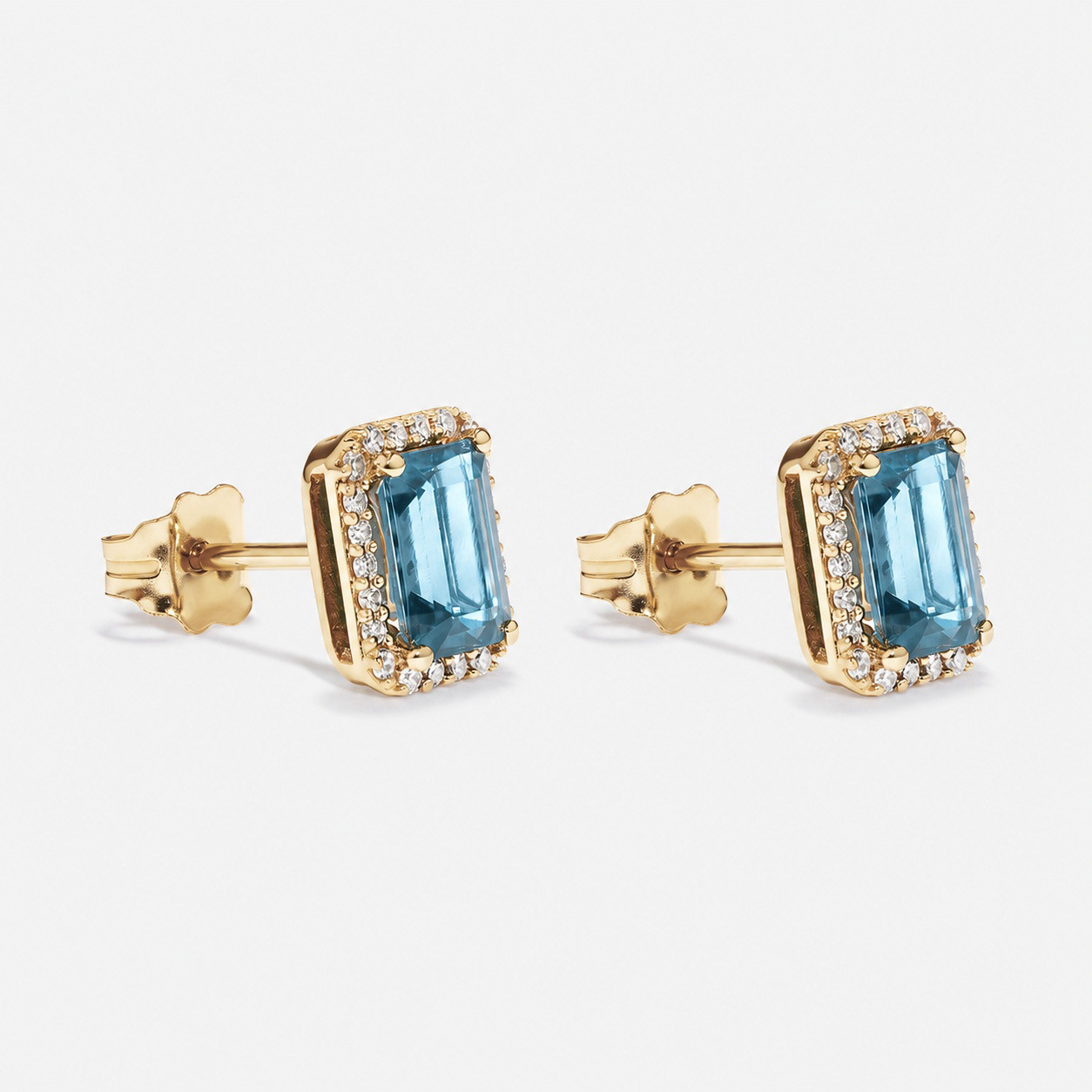 Emerald Cut Blue Topaz and Diamond Halo Earrings in 10kt Yellow Gold