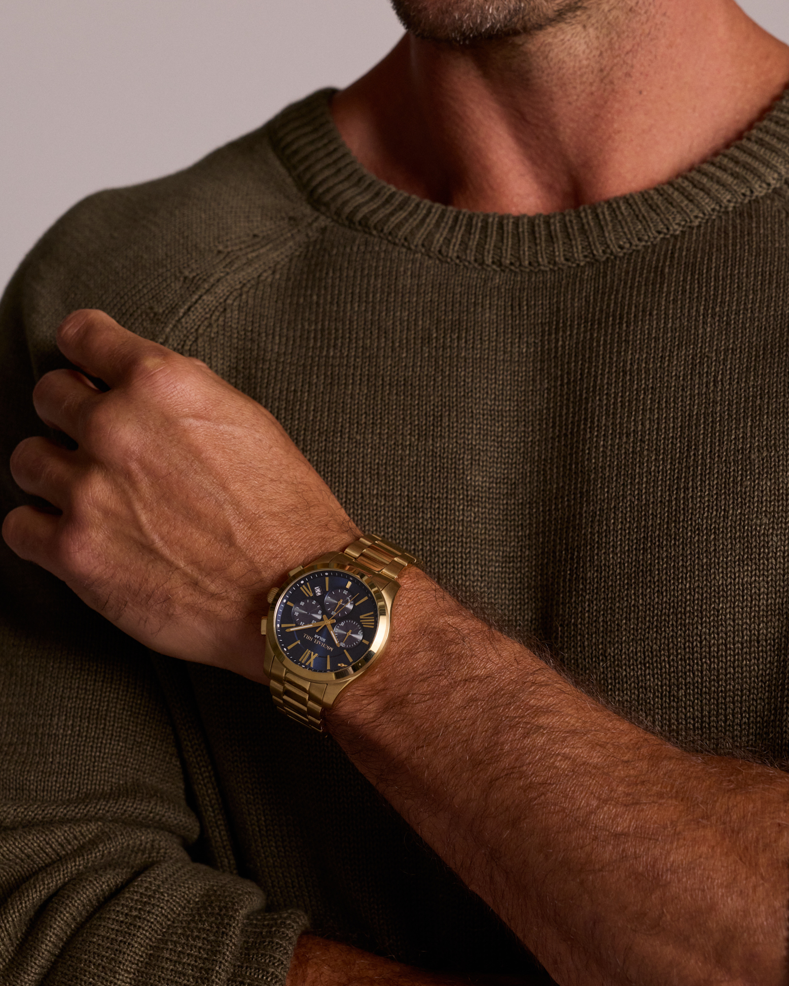 Montre chronographe solaire pour homme en acier inoxydable doré