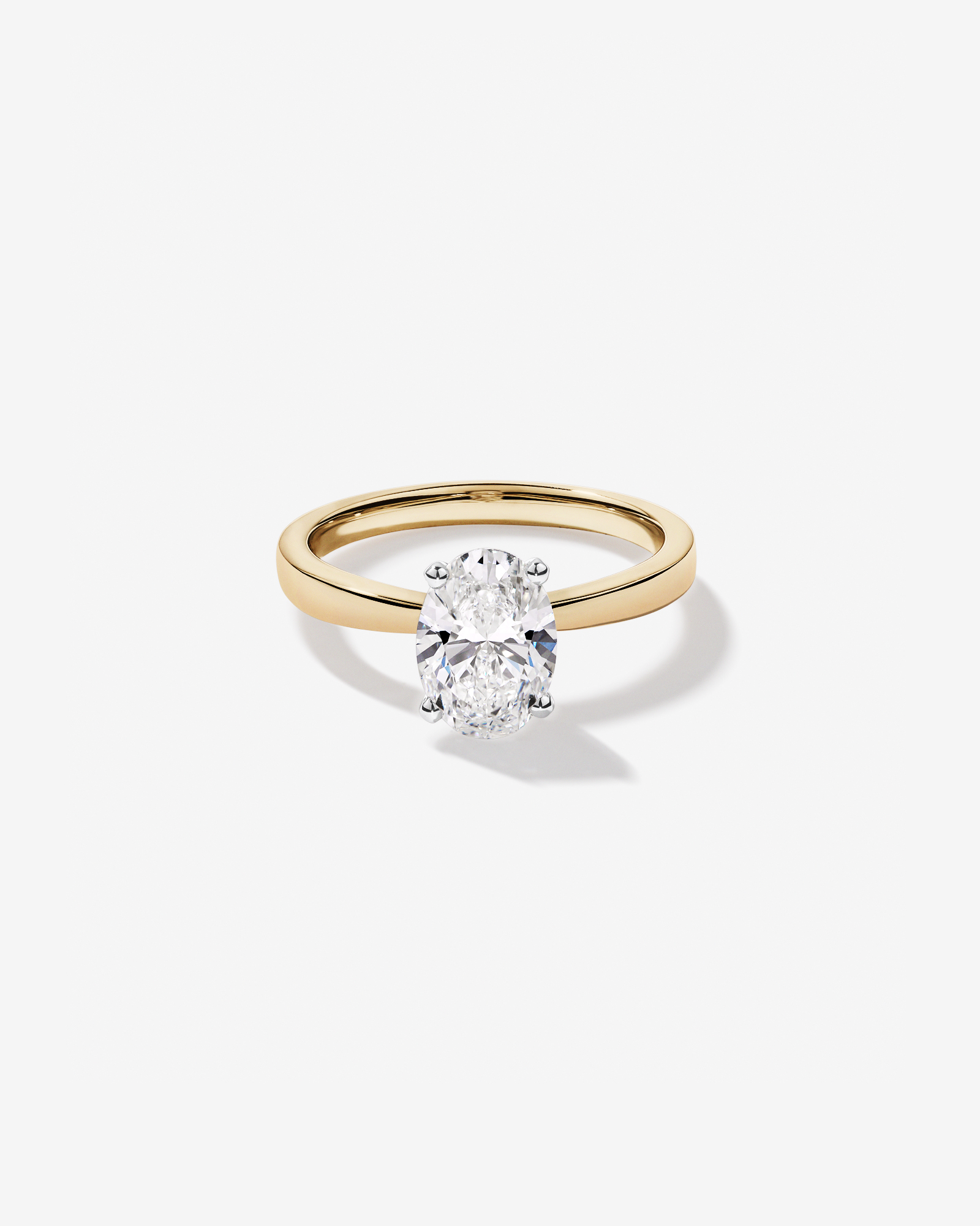 Carat TW Oval Cut Lab-Grown Diamond Solitaire Engagement Ring 14kt Yellow and White Gold