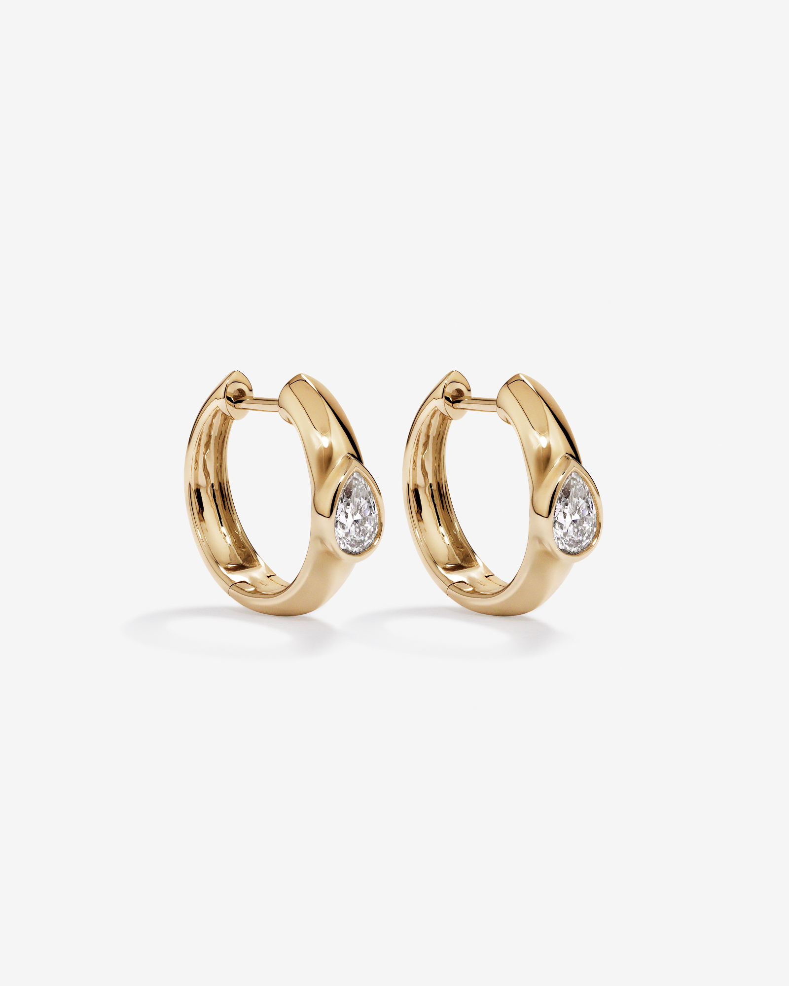 0.50 Carat TW of Laboratory-Grown Pear Cut Diamond Huggie Earrings in 10kt Yellow Gold