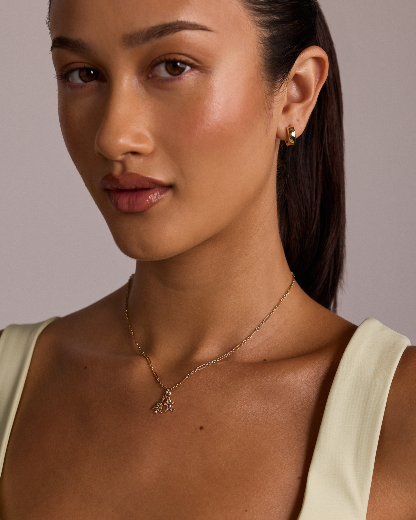 Gingerbread Pendant with Round Created Rubies in 10kt Yellow Gold