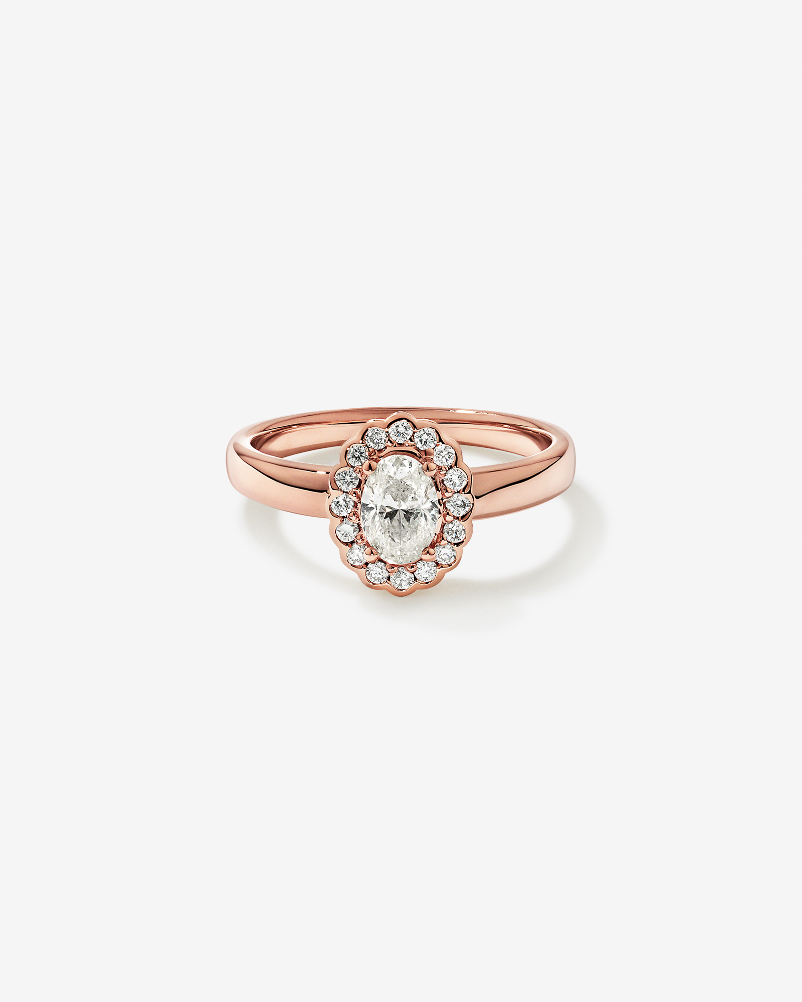Bague à halo floral avec diamant ovale de 0,60 carat (poids total) en or rose 14 carats