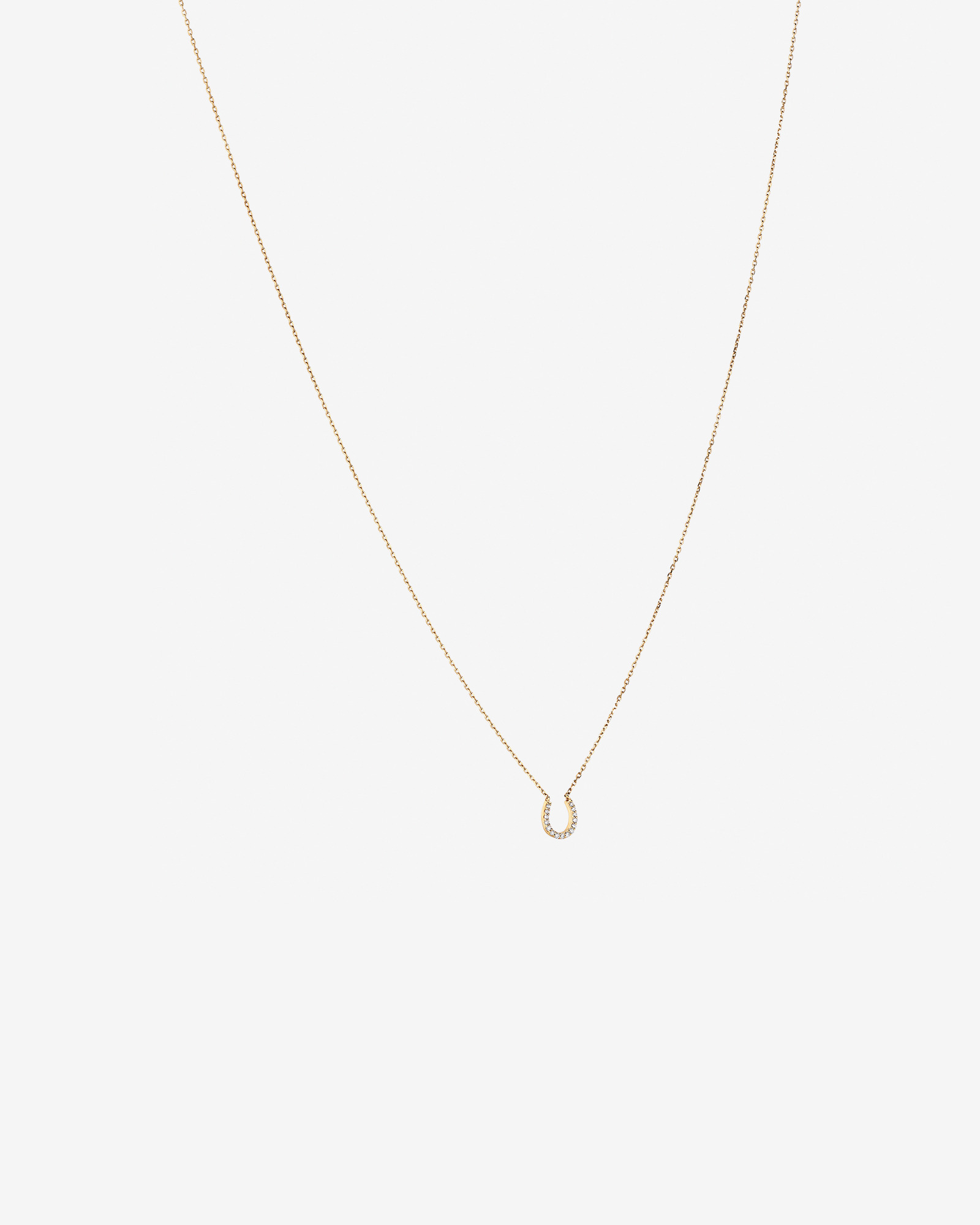 Collier à pendentif fer à cheval en or jaune 10 K avec diamants totalisant 0,10 ct