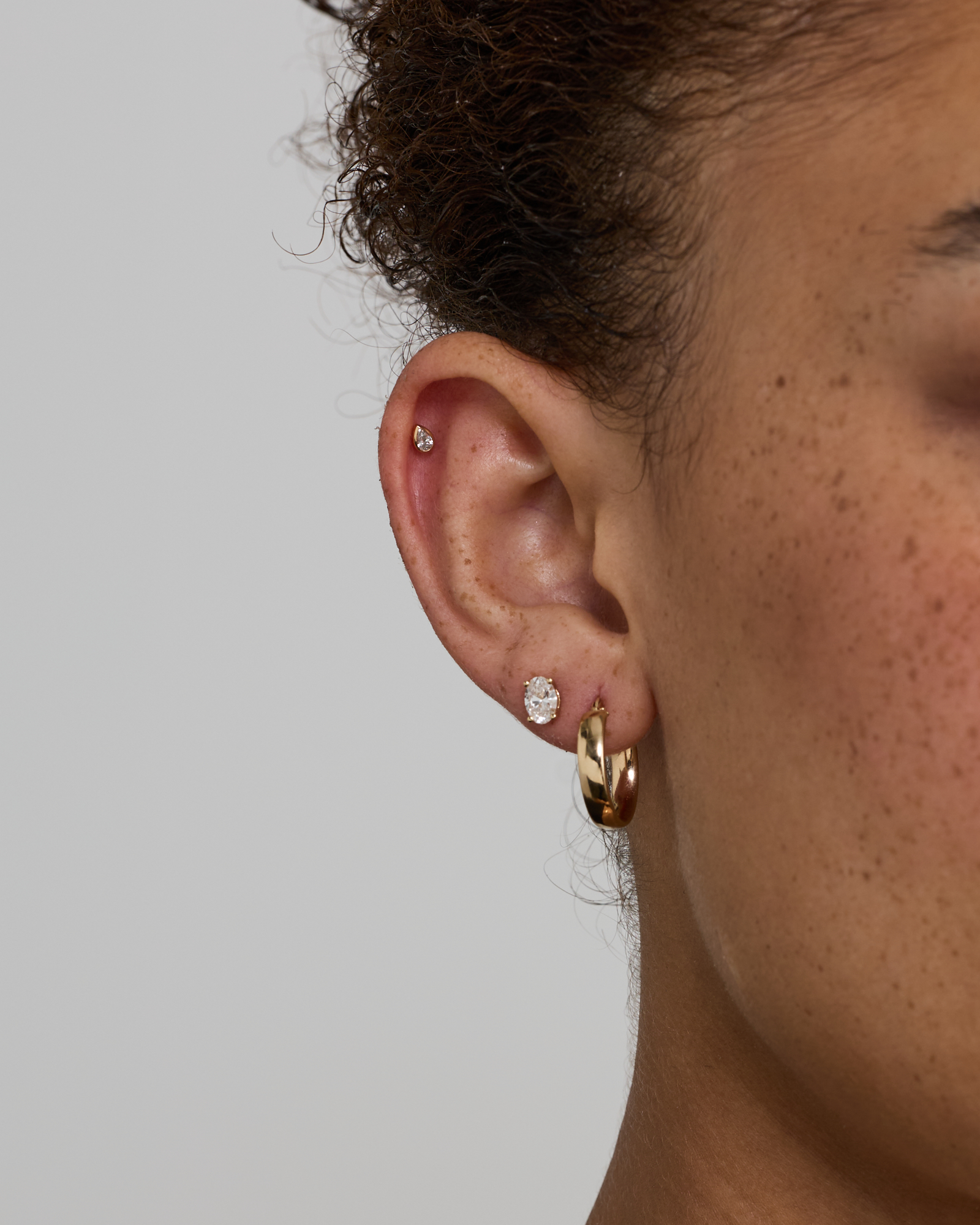 Pear Cut Helix Single Stud Earring with 0.05 Carat TW of Diamonds in 10kt Gold
