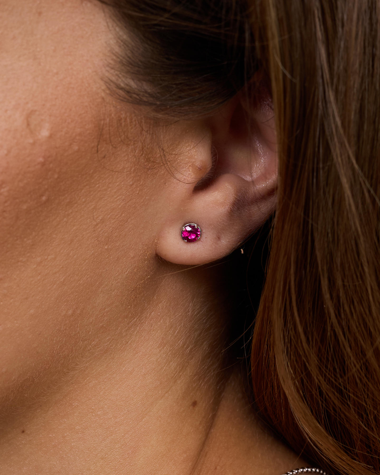 Round Created Ruby Stud Earrings in Sterling Silver