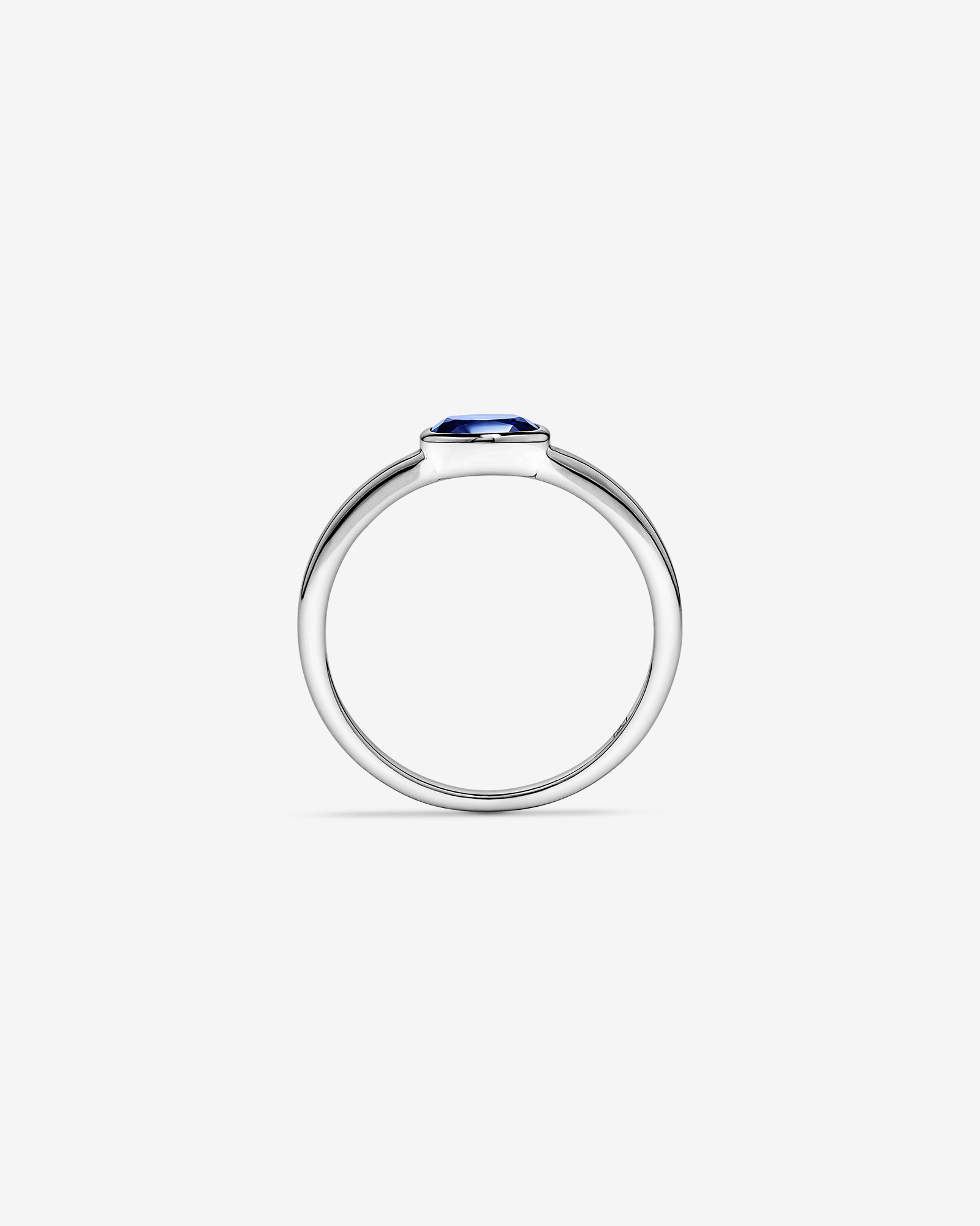 Oval Blue Created Sapphire East-to-West Set Bezel Ring 10kt Gold