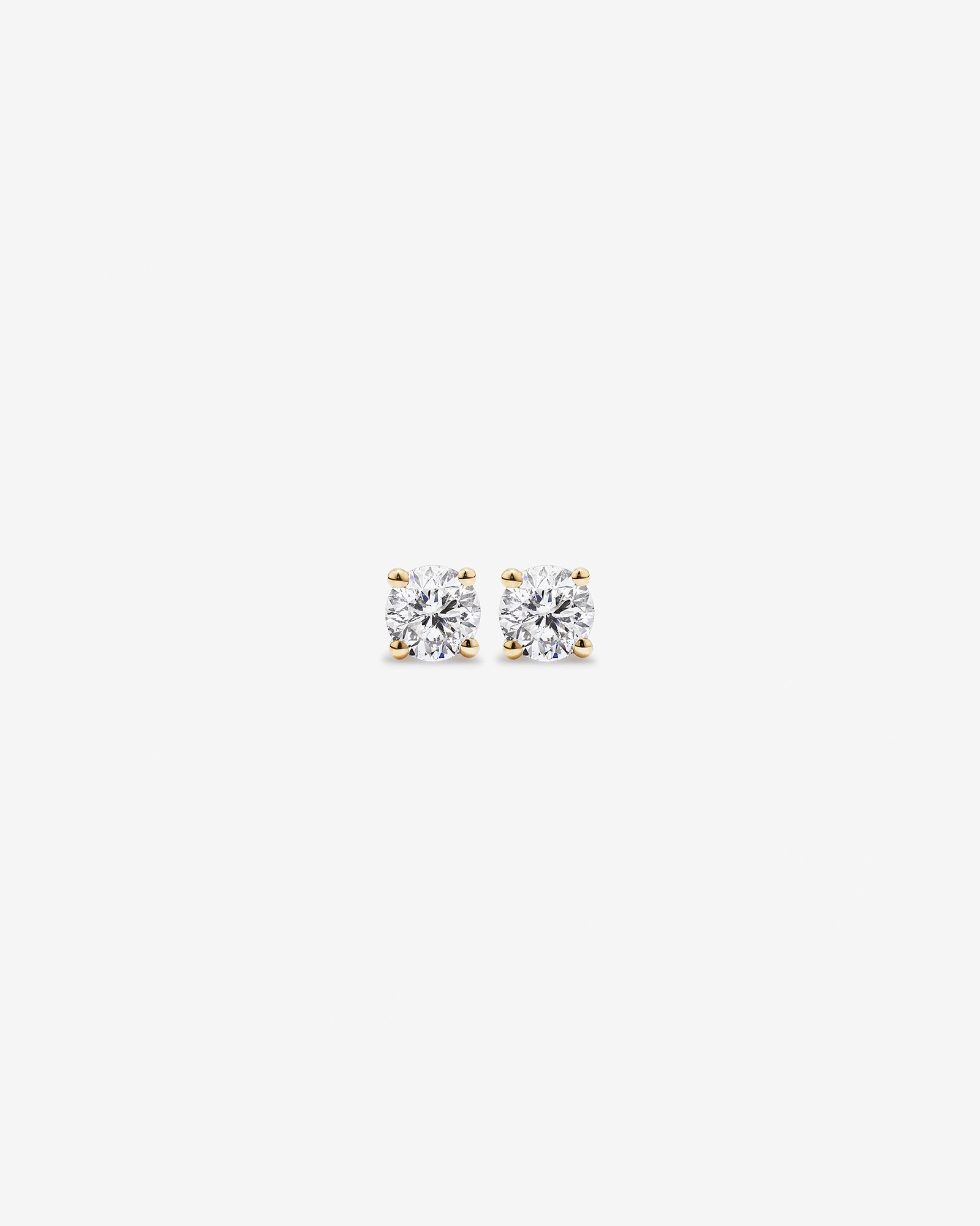 Boucles d’oreilles solitaires rondes avec diamants brillants TW certifiées de 0,25 carat en or jaune 18 carats