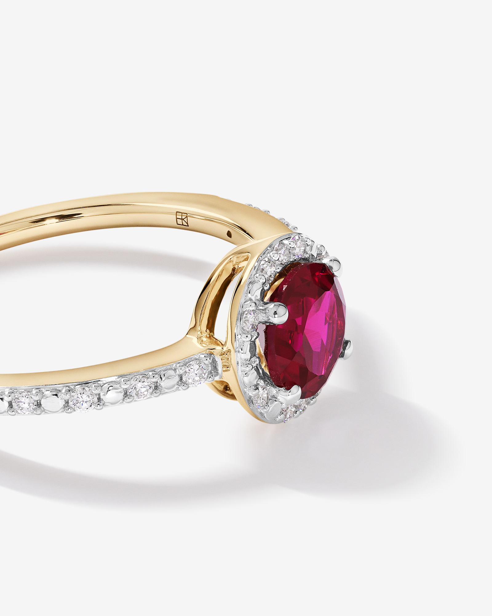 Round Cut Red Created Ruby and Lab-Grown Diamond Halo Ring in 10kt Yellow Gold and Rhodium