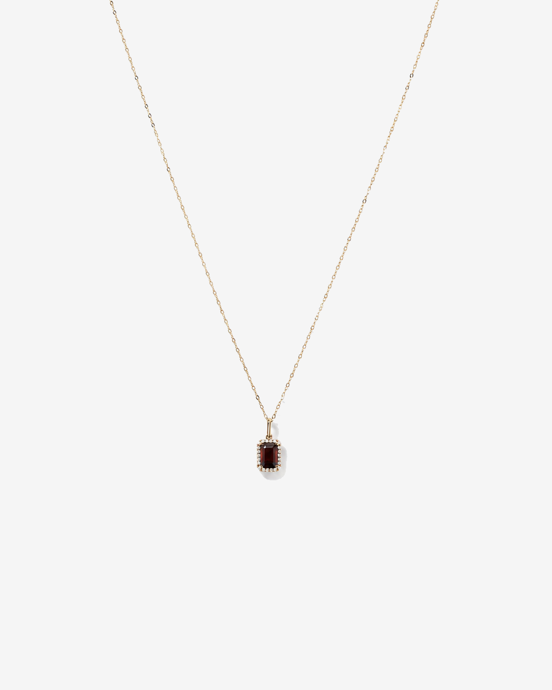 Emerald Cut Garnet and Diamond Halo Pendant with Chain in 10kt Yellow Gold