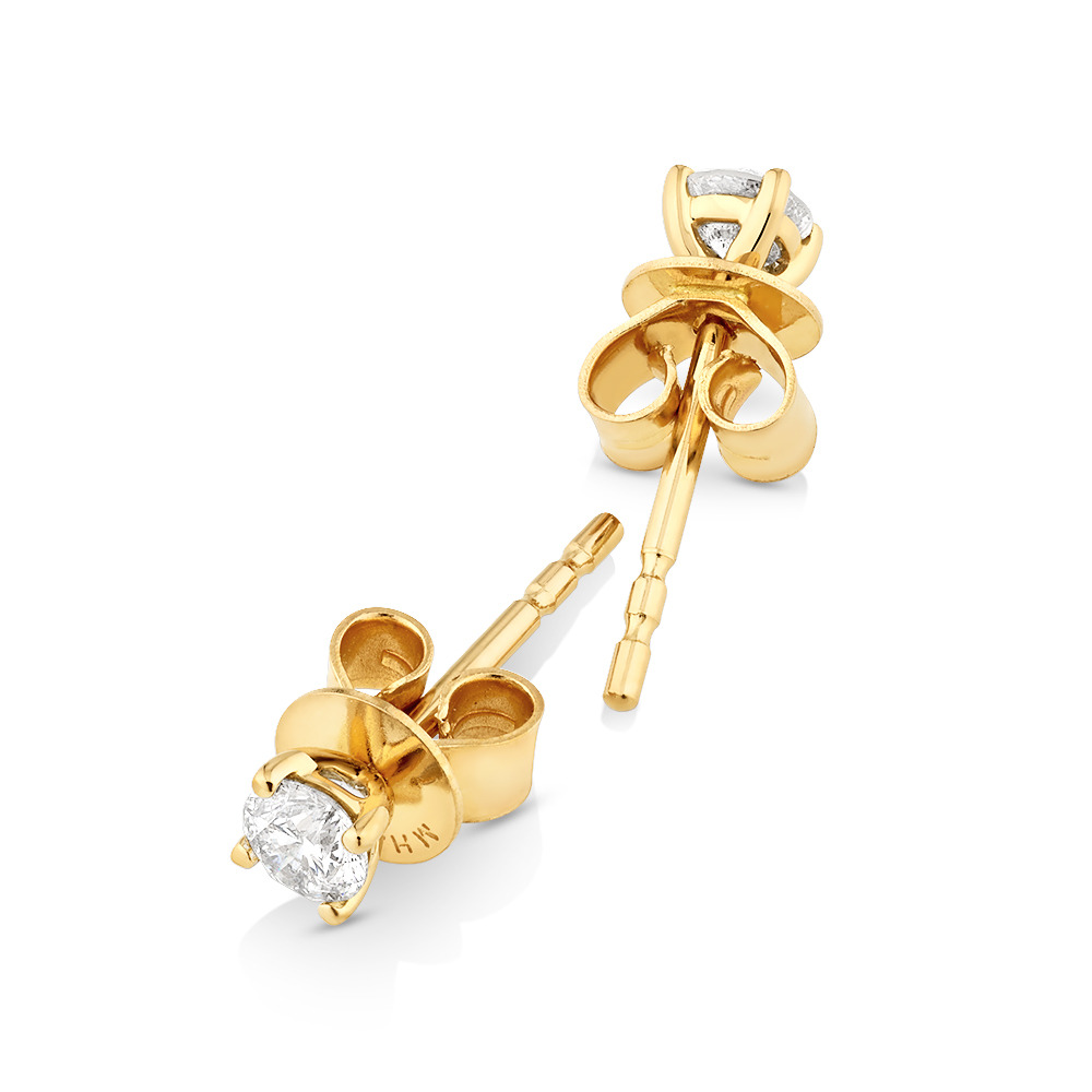 0,25 Carat TW Boucles d'oreilles puces solitaires en or jaune 18kt