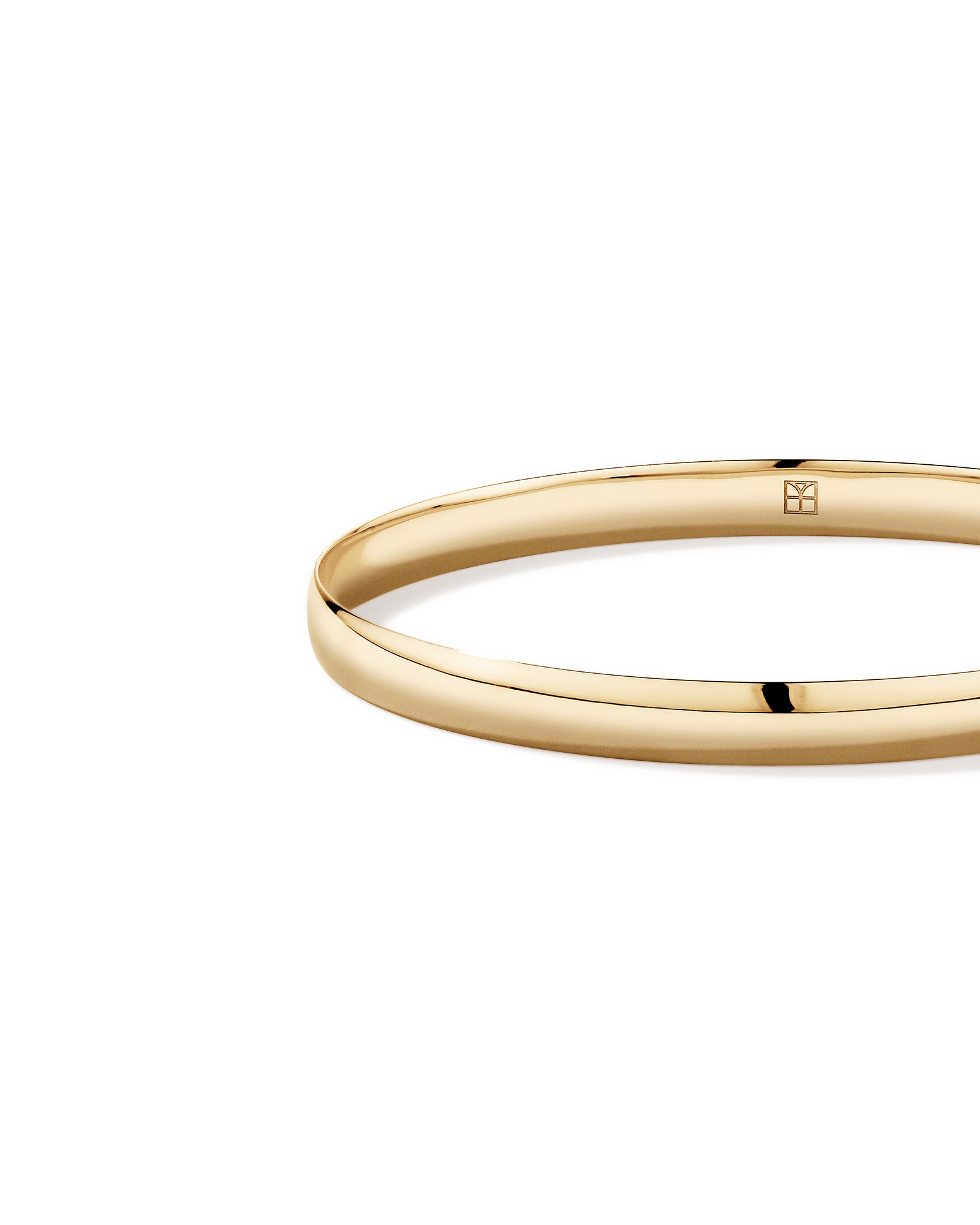 65mm (2.5") 5.7mm Width Solid Oval Bangle in 10kt Yellow Gold