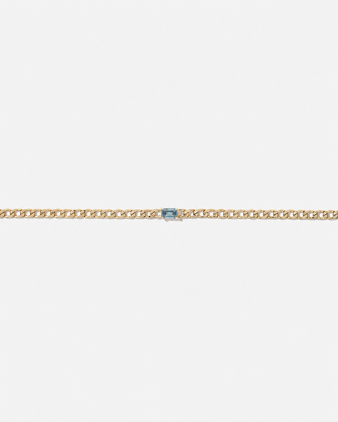 Bracelet gourmette Topaze bleue en or jaune 10 ct