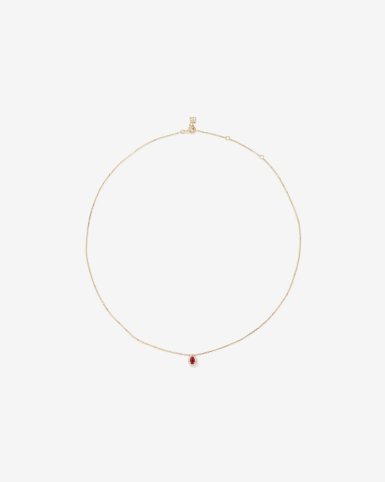 Pear Cut Red Ruby Gemstone and 0.05 Carat TW Diamond Halo Necklace in 10kt Yellow Gold