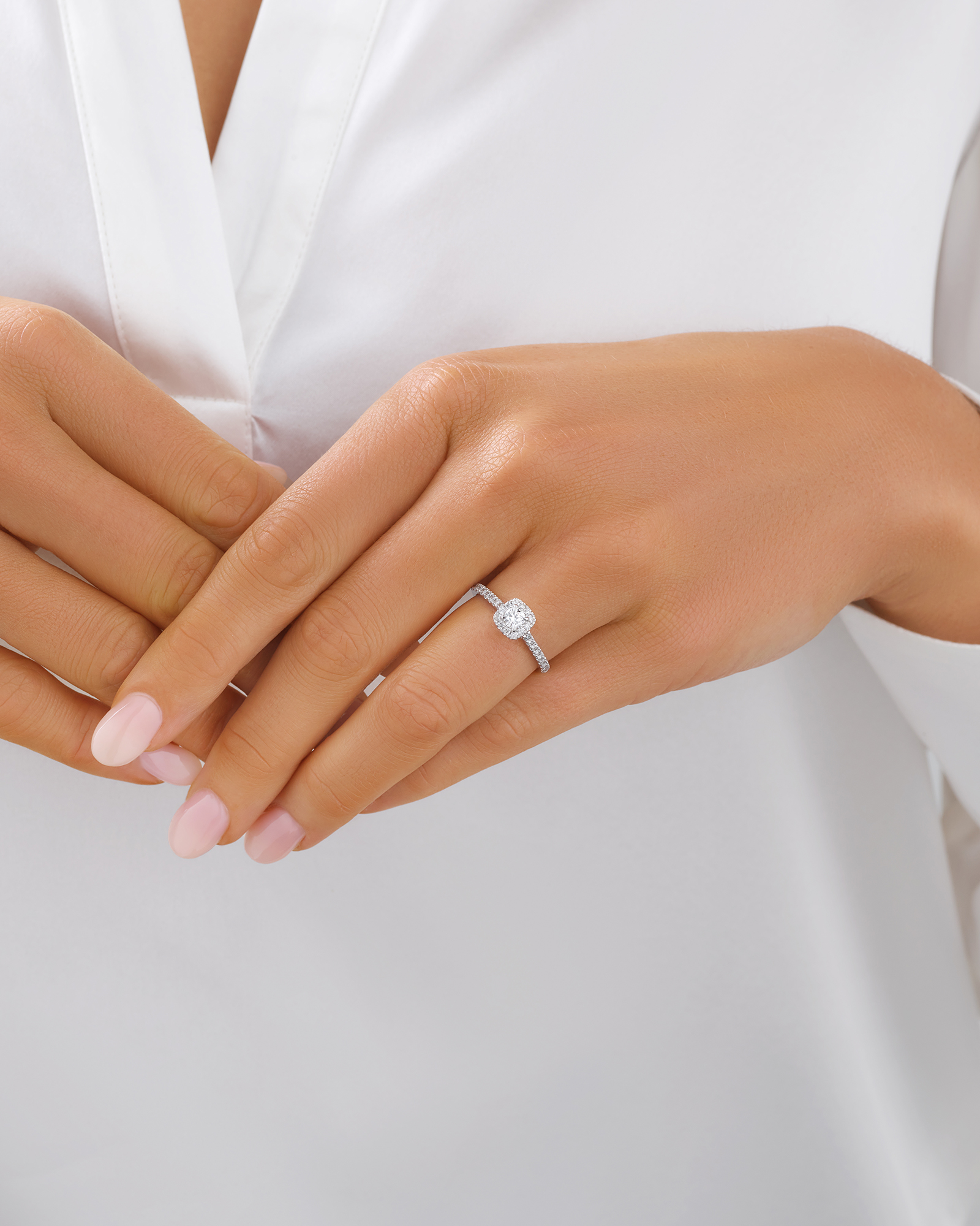 Round Brilliant Cushion Shaped Halo Ring with 0.50 Carat TW of Diamonds in 14kt White Gold
