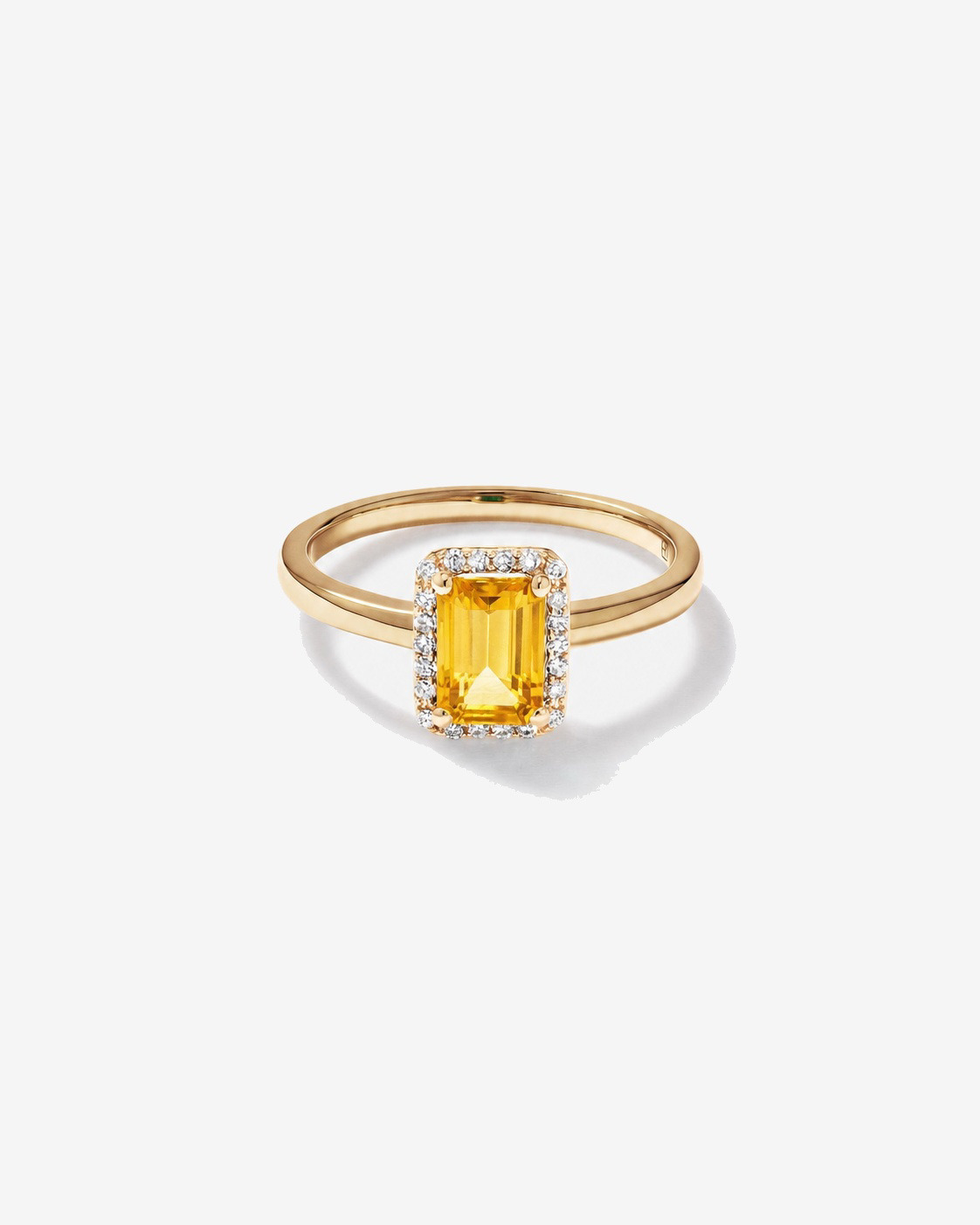 Bague en or jaune 10 carats avec citrine taille émeraude et halo de diamants