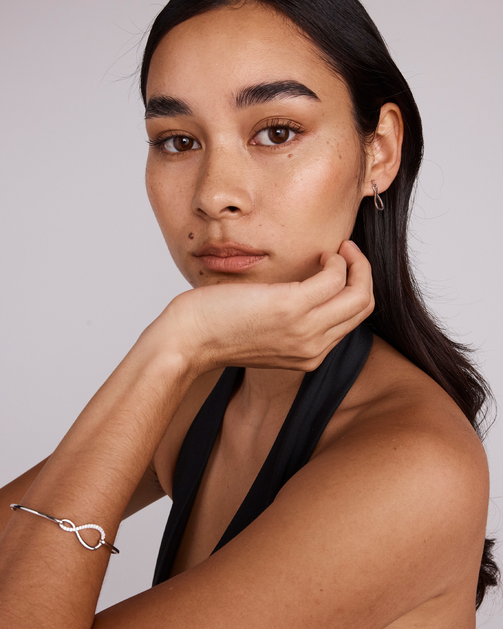 Cubic Zirconia Infinity Bangle in Sterling Silver