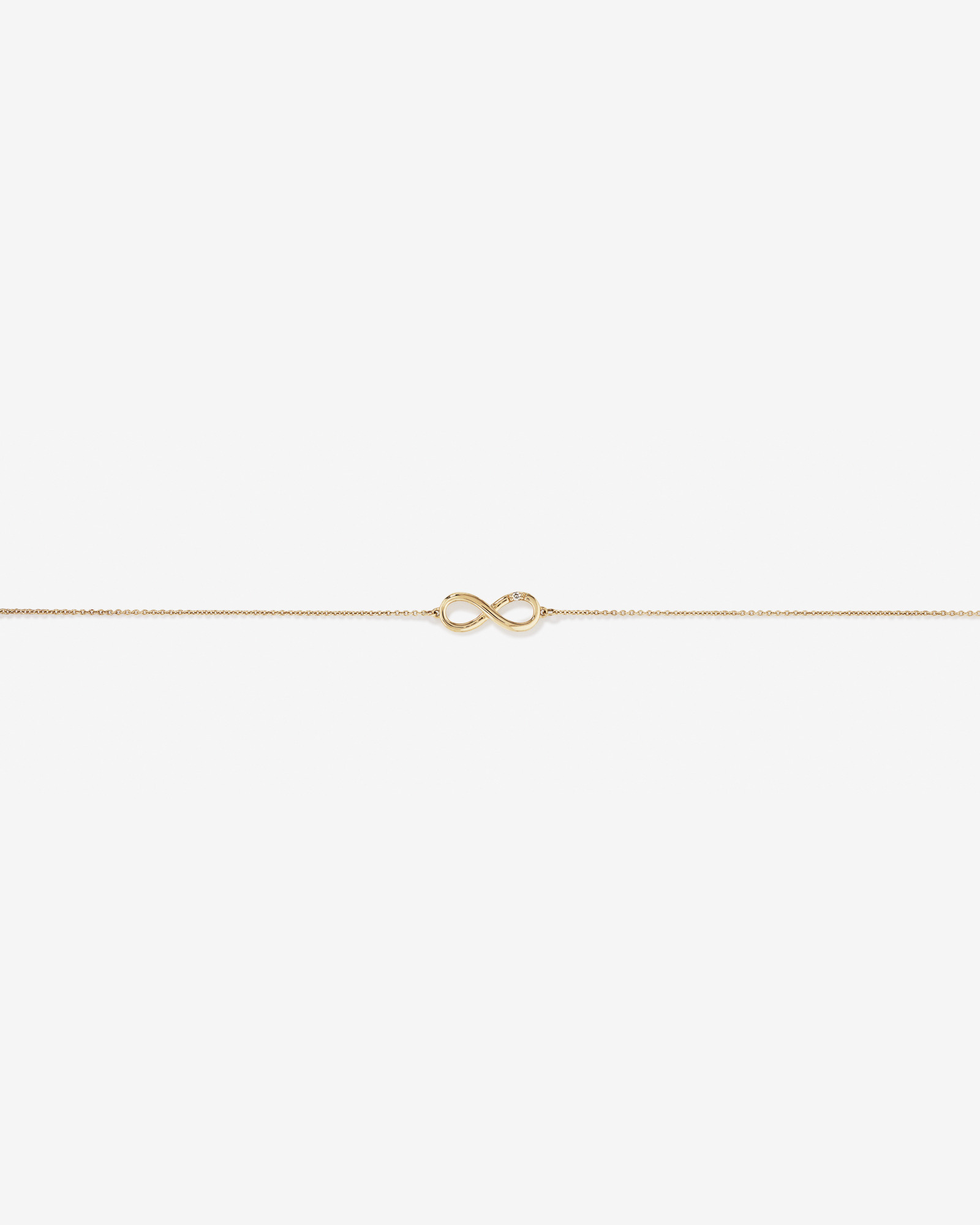 Bracelet infini orné d'un diamant en or jaune 10kt
