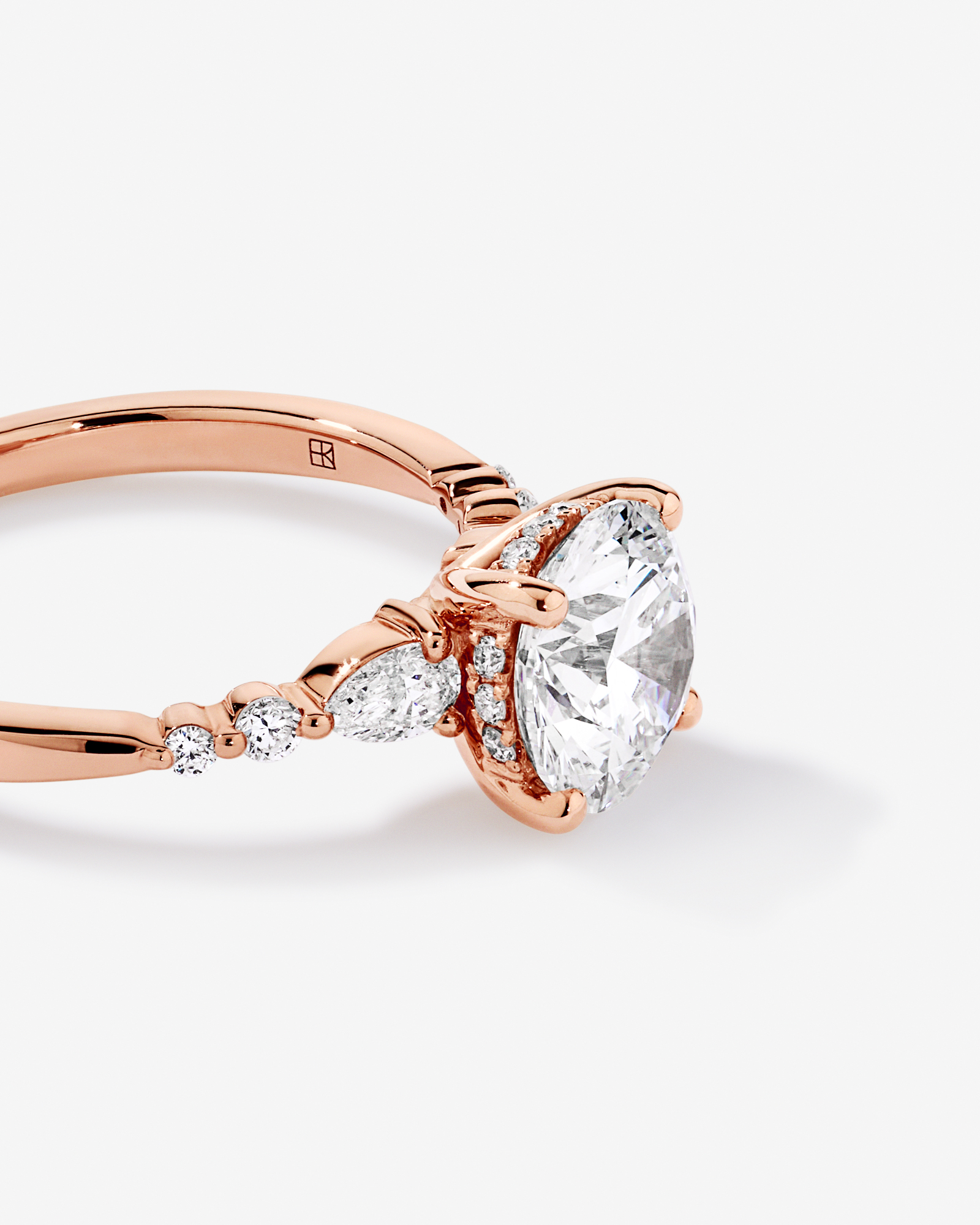 2.28 Carat TW Round Brilliant and Pear Laboratory-Grown Diamond Side Accent Ring 14kt Rose Gold