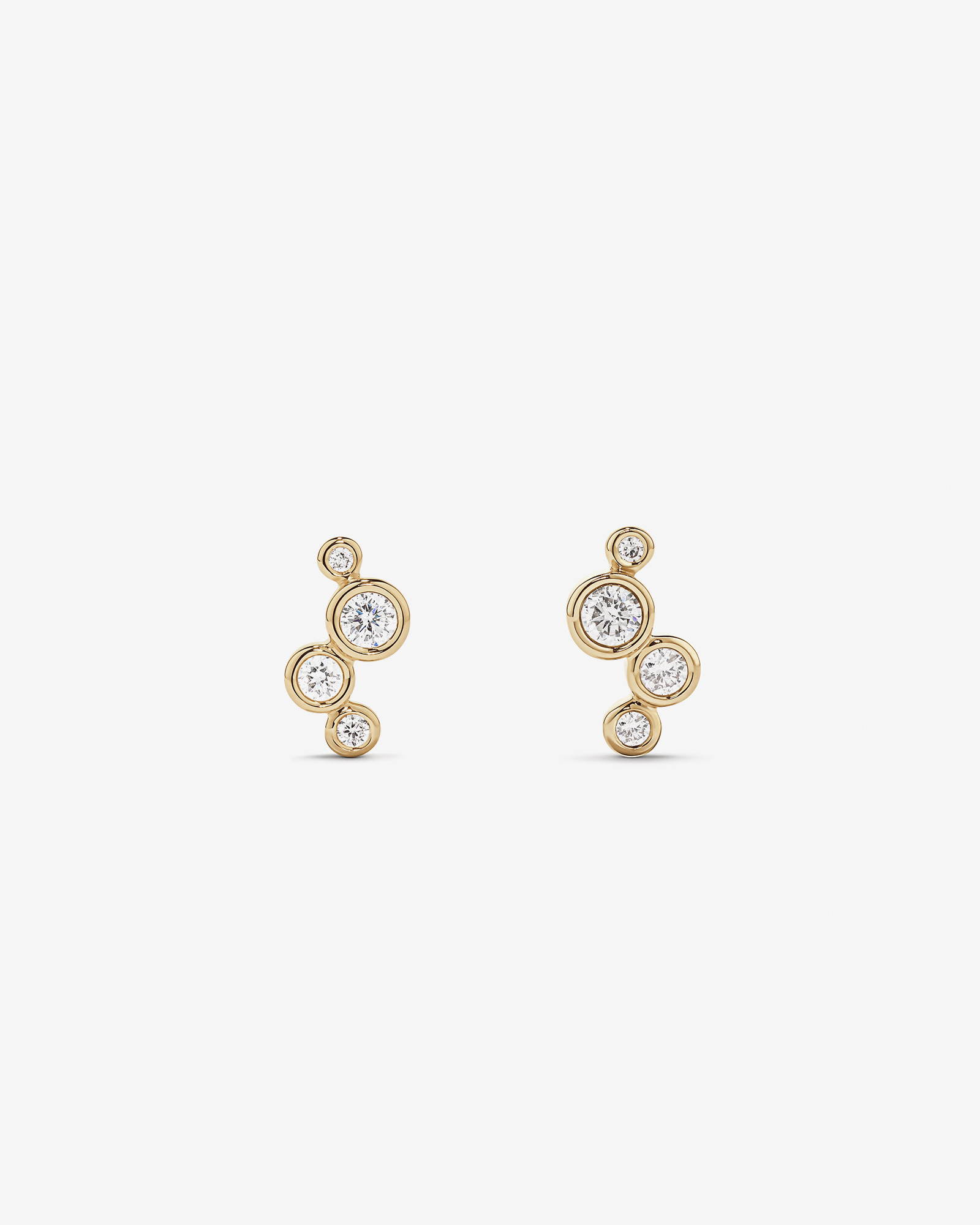 Boucles d’oreilles rondes TW à lunette graduée brillante de 0,15 carat en or jaune 10 carats