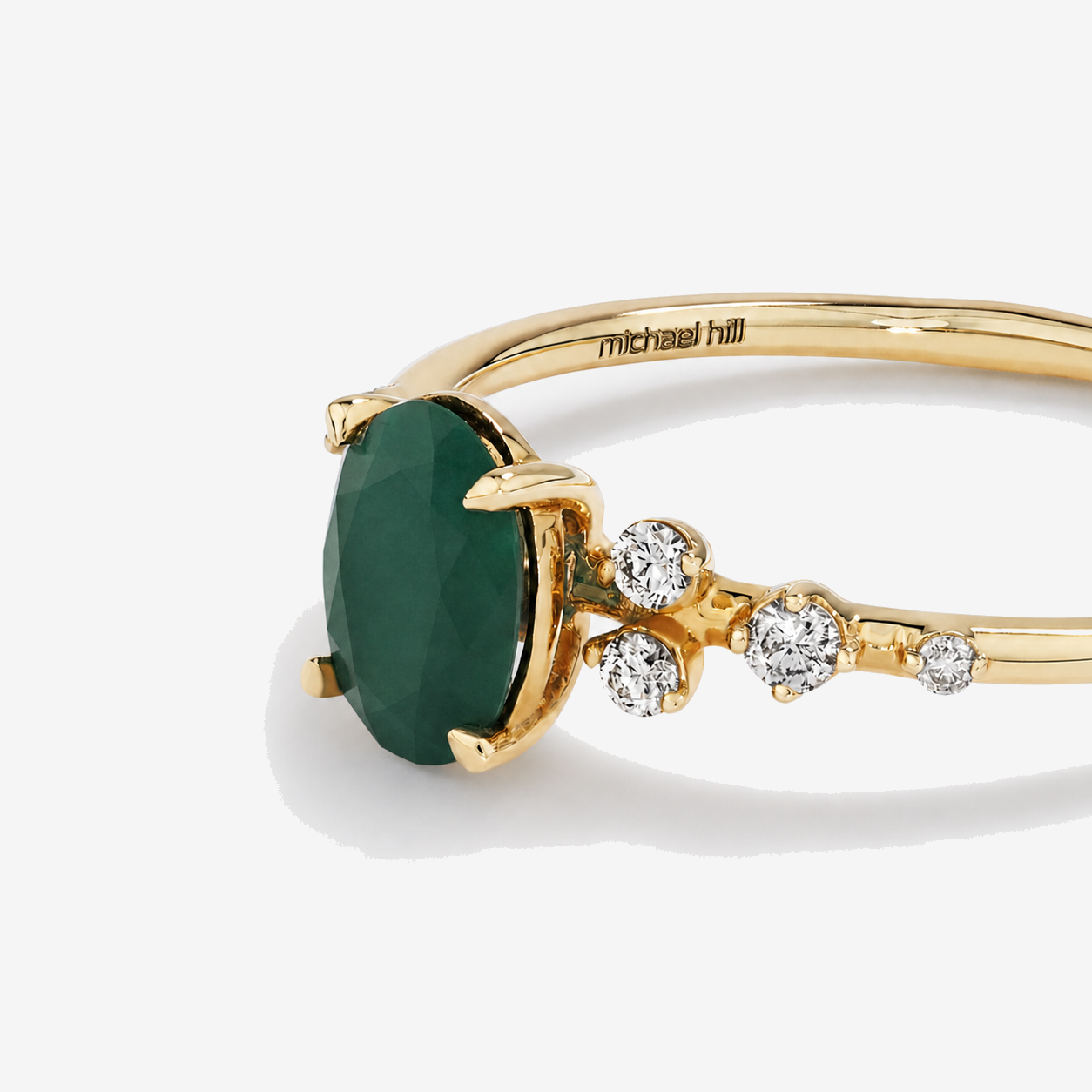 Emerald and 0.12 Carat TW Diamond Ring 10kt Yellow Gold