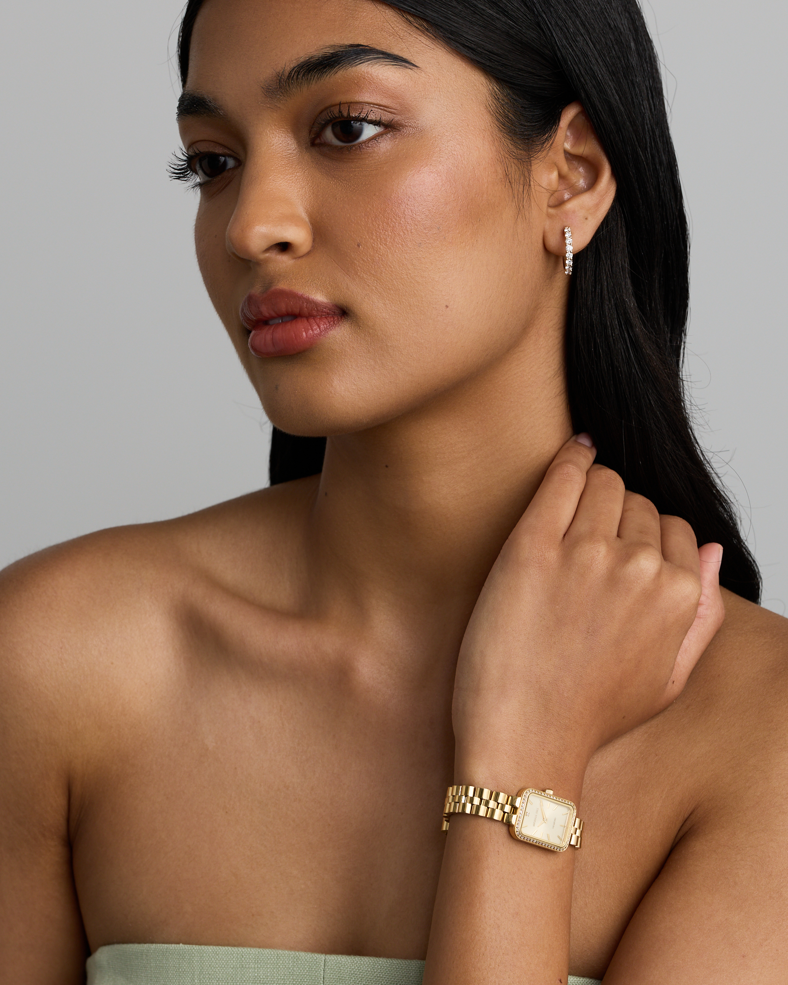 Montre féminine 0,20 carat TW à lunette diamant en acier inoxydable couleur or