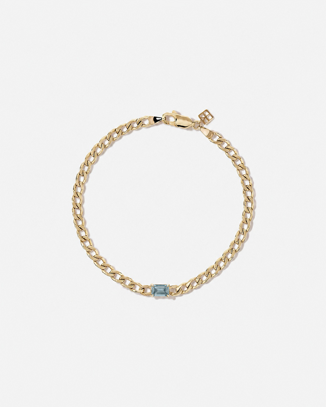 Bracelet gourmette Topaze bleue en or jaune 10 ct