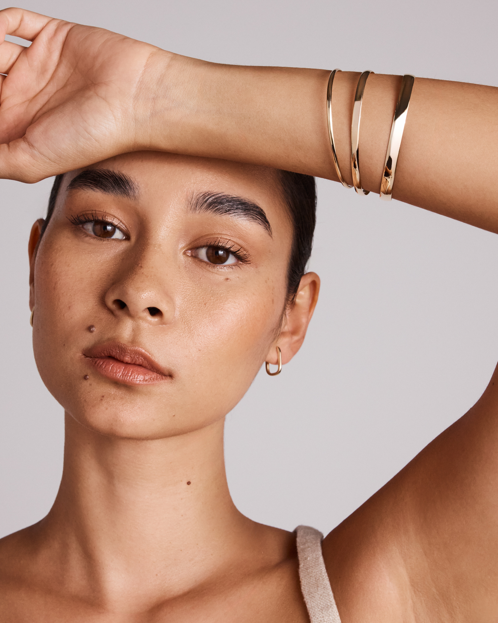 65mm (2.5") 5.7mm Width Solid Oval Bangle in 10kt Yellow Gold