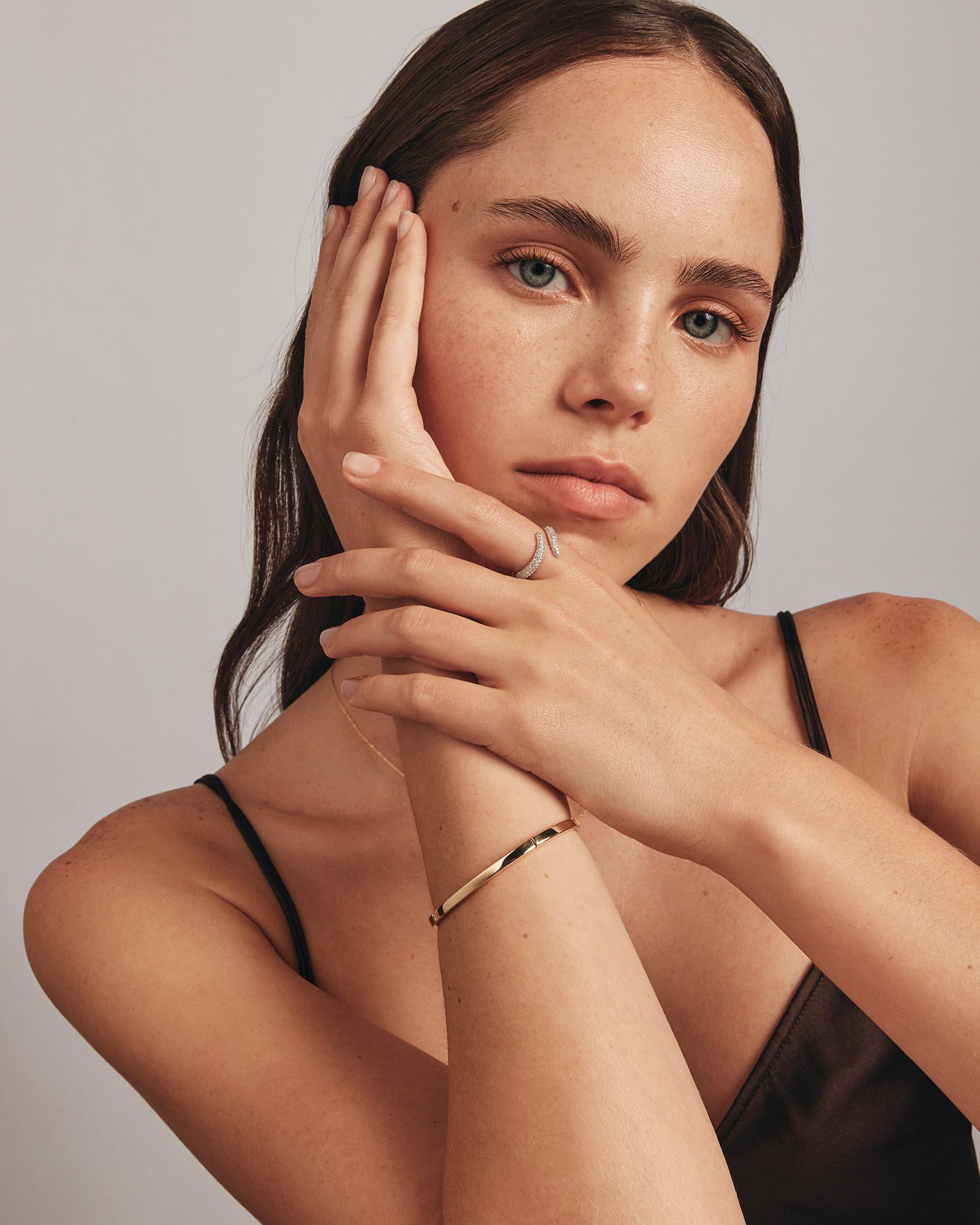 Diamond Accent Oval Bangle in 10kt Yellow Gold