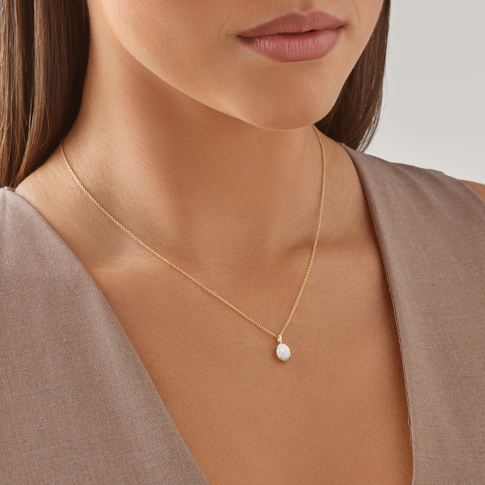 Pendentif en or jaune 10 K avec opale