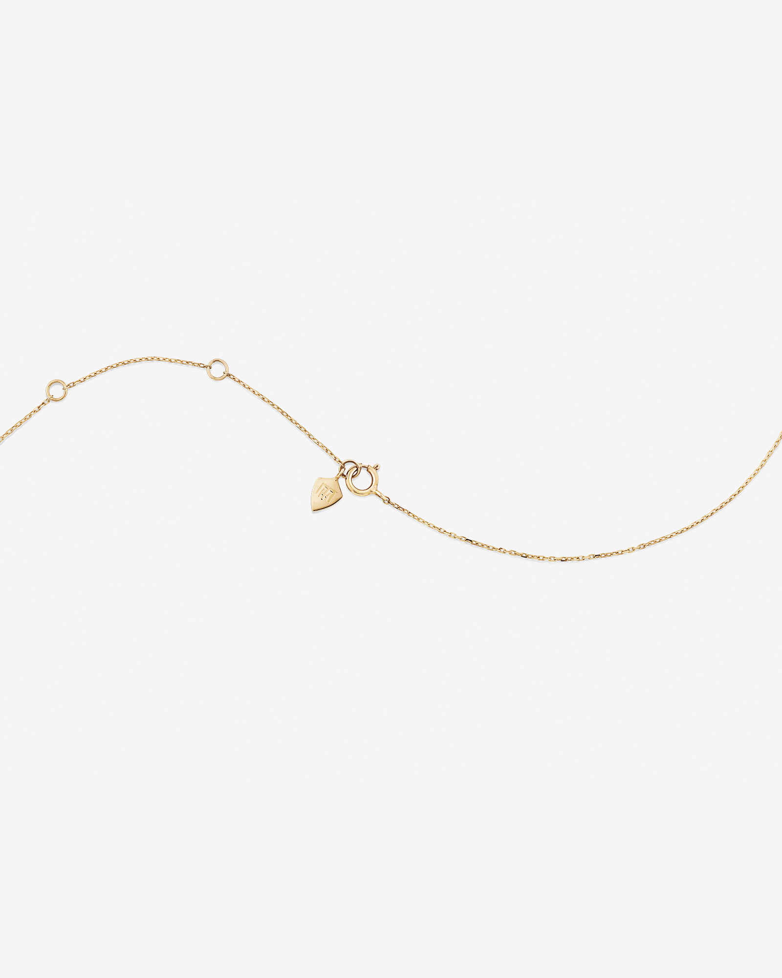 Pendentif trombone en or jaune 10 K avec diamants totalisant 0,02 ct