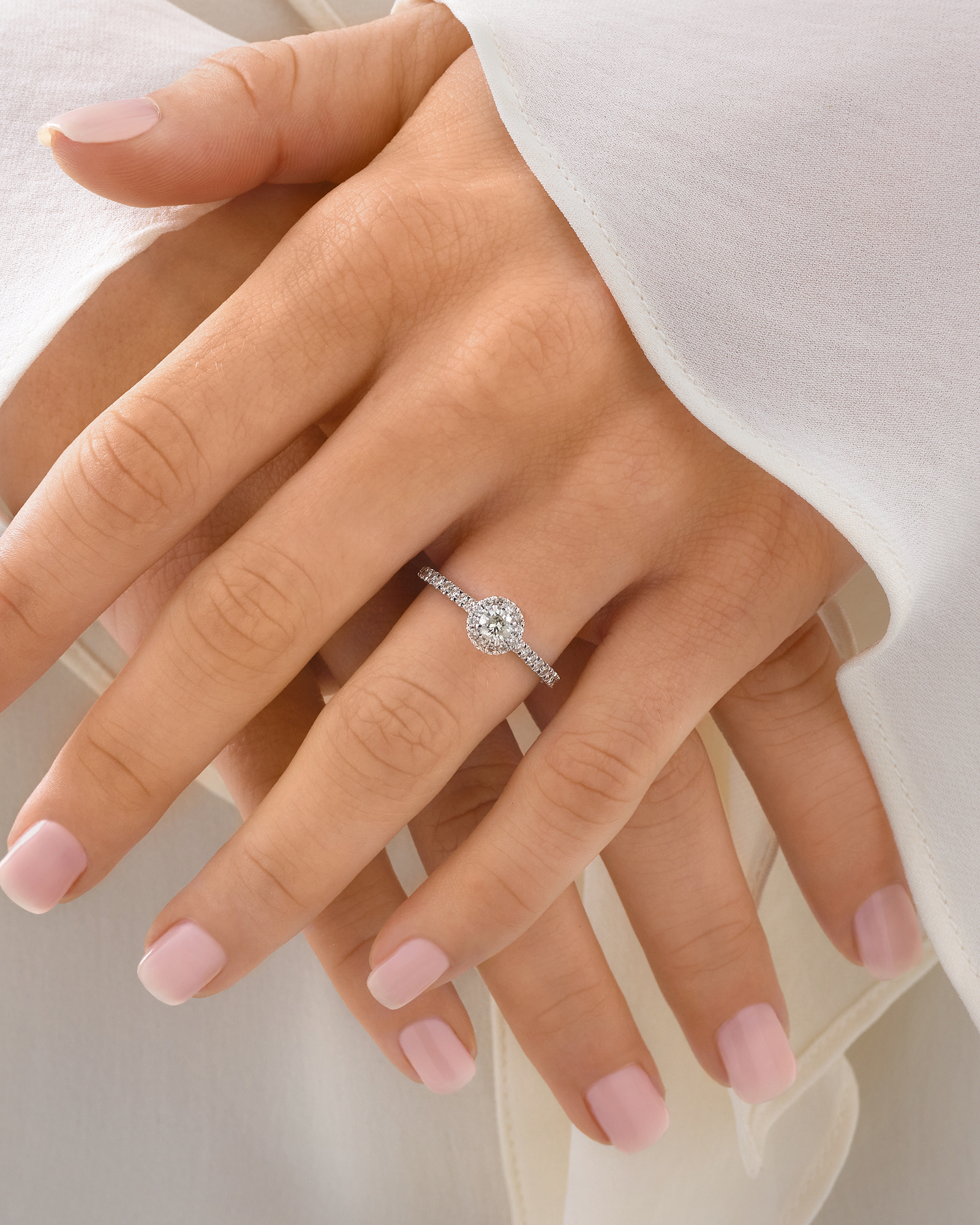 Round Brilliant Halo Ring with 0.50 Carat TW of Diamonds in 14kt White Gold