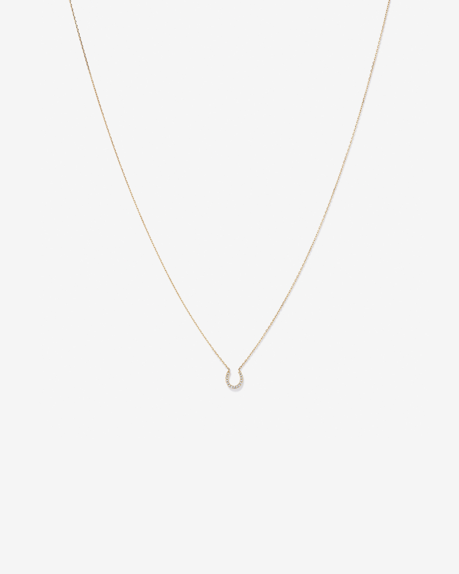 Collier à pendentif fer à cheval en or jaune 10 K avec diamants totalisant 0,10 ct