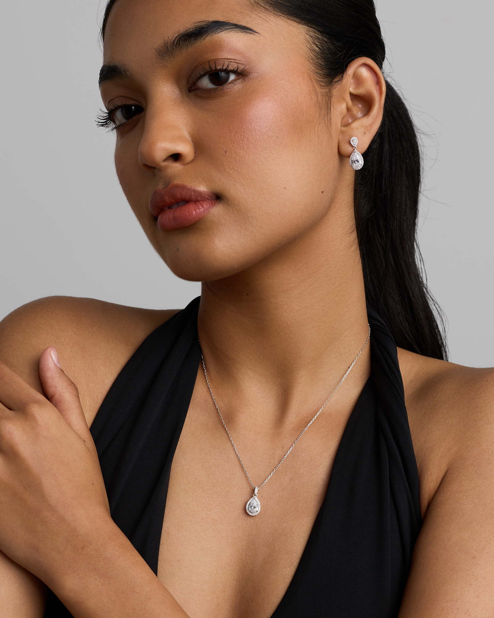 Pear Cubic Zirconia Halo Pendant Necklace in Sterling Silver