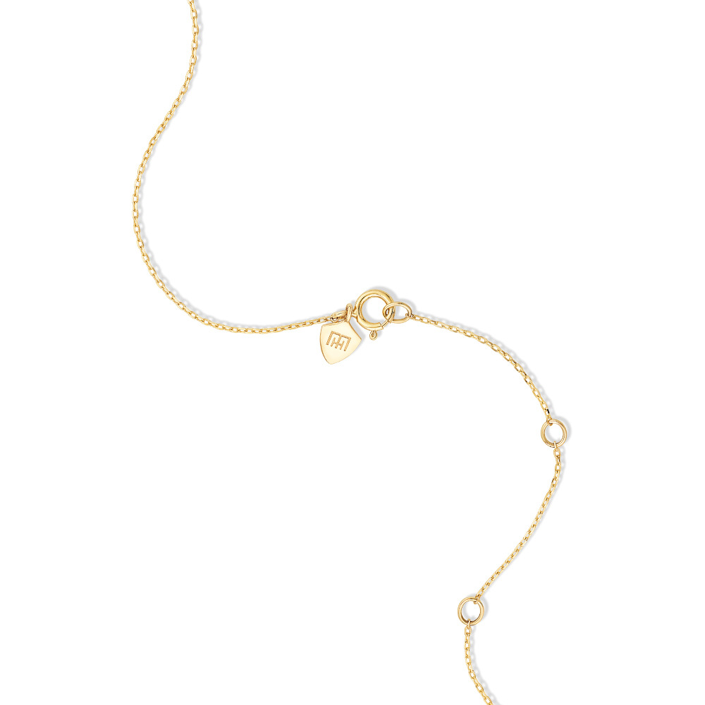 Médaillon ovale orné de diamants en or jaune 10kt