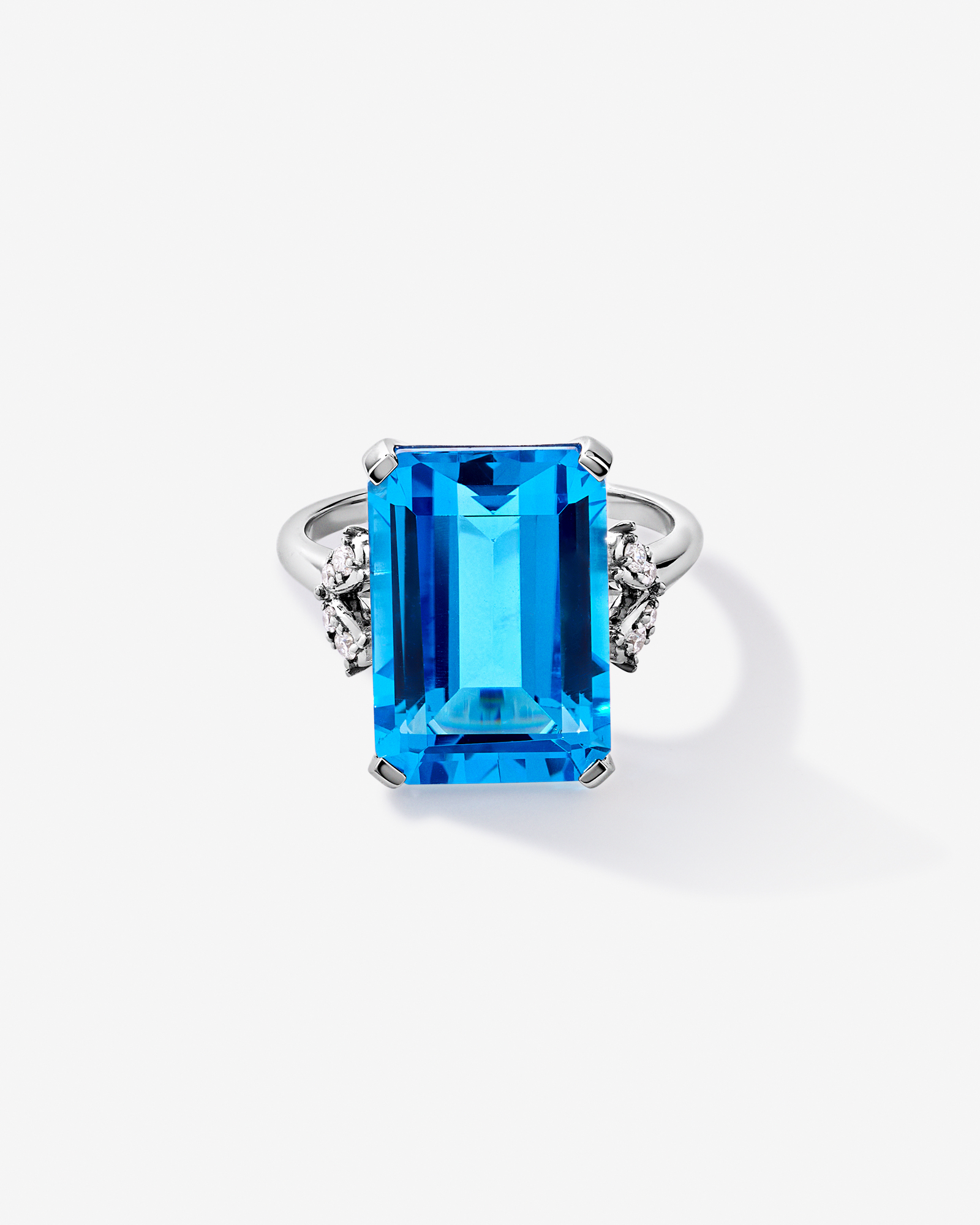 Emerald Cut Swiss Blue Topaz & 0.08 Carat TW Diamond Ring 10kt Gold